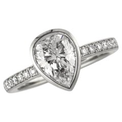 GIA Certified 1.90 Carats E VVS1 Pear Diamond Bezel Pavé Ring in 18K White Gold