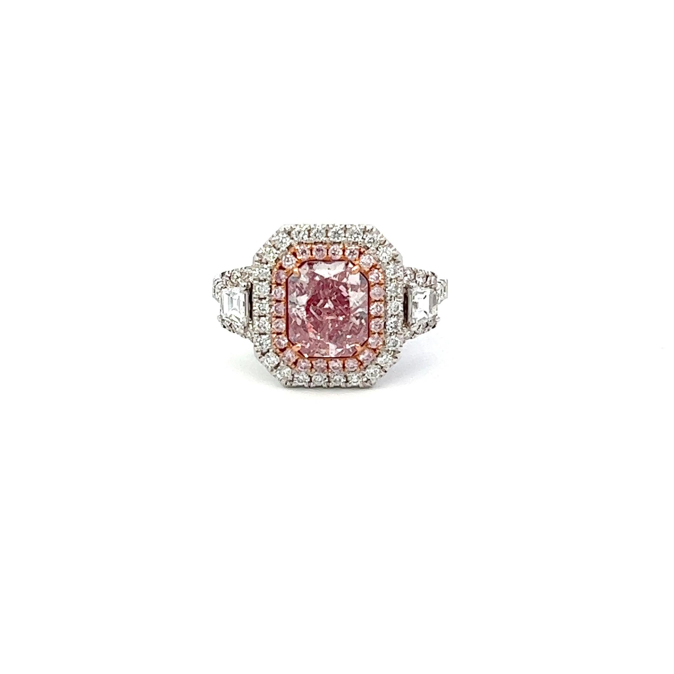 Center: 1.90ct Fancy Purplish Pink Radiant I1 GIA #2191256003
Setting: 18k White Gold 0.84ctw Pink and White Diamonds

An extremely rare and stunning natural pink diamond center. Pink Diamonds account for less than 0.01% of all diamonds mined in the
