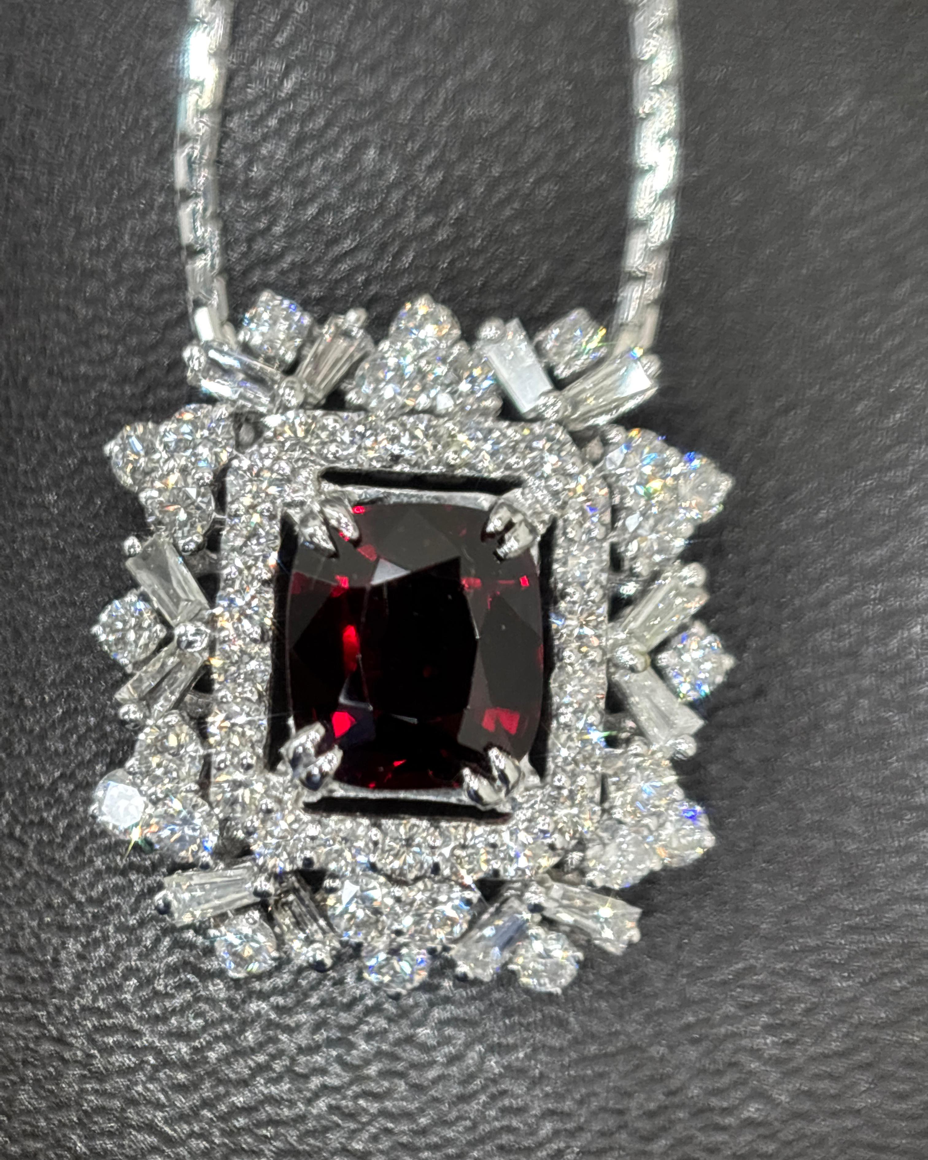 Exuding timeless elegance and exceptional rarity, this exquisite pendant features a GIA-certified 1.91 carat natural red spinel from Mogok, Burma—renowned for producing the world’s most coveted spinels. Untreated and unheated, this fine cushion-cut