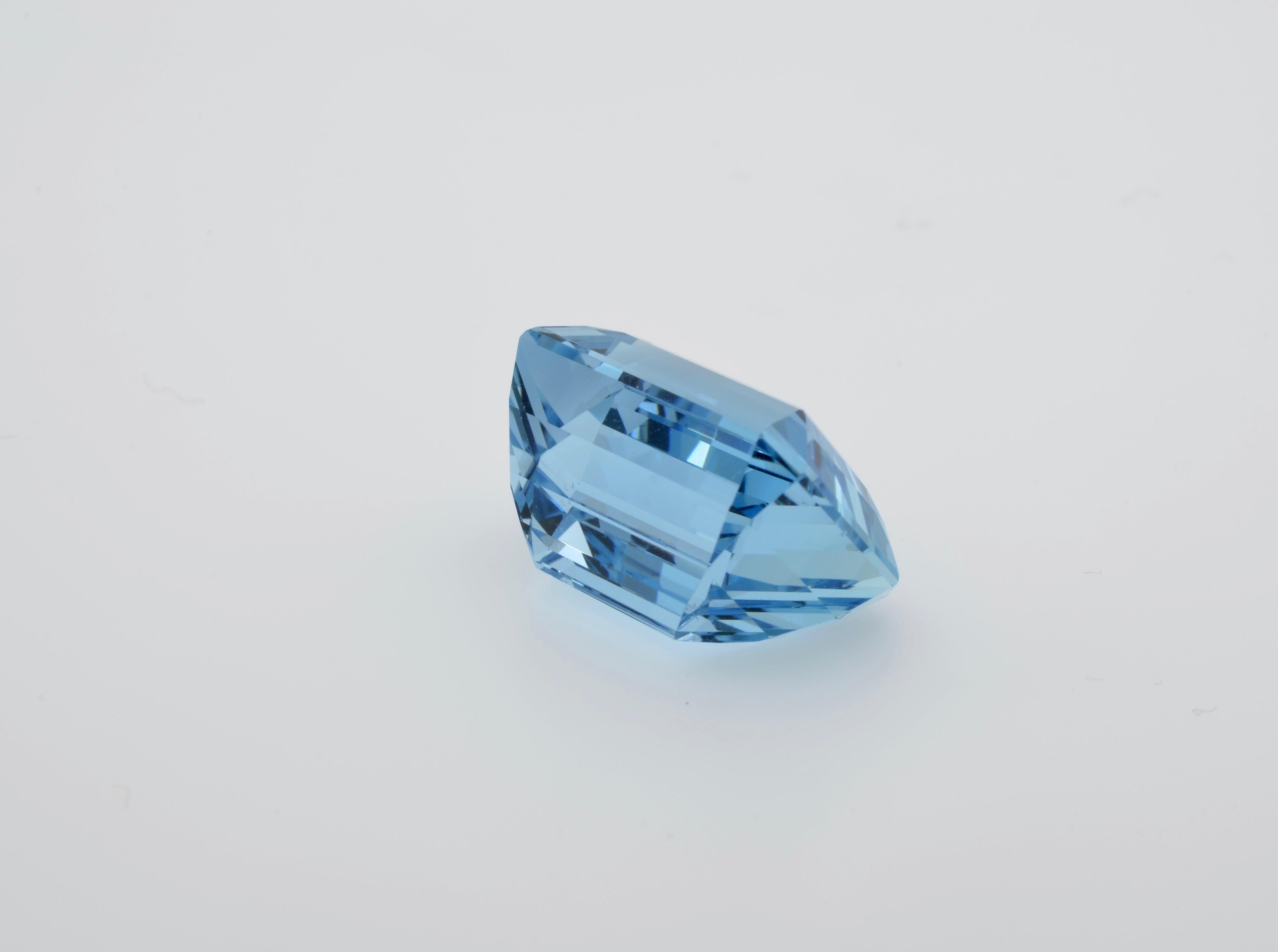 This GIA Certified 19.18 carats Aquamarine is a natural deep blue, and is cut unlike other crystals of this variety.  It is completely clear and can be mounted as a single stone in a ring as well as a pendant.  Most likely it was mined at Minas