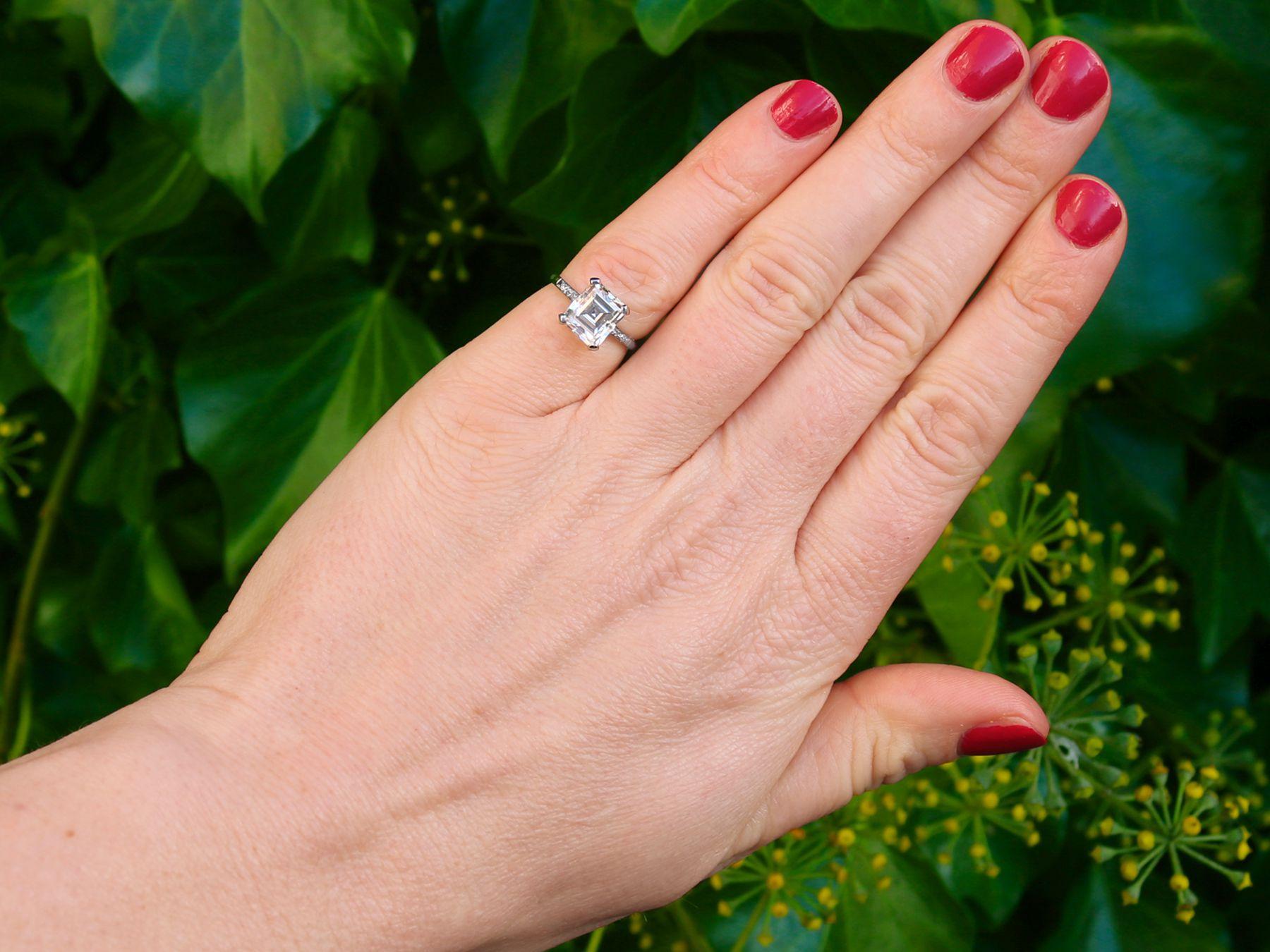 A stunning, rare antique hand cut 2.84 carat rectangular diamond solitaire engagement ring displayed in platinum; part of our diverse diamond ring collections.

The pierced decorated setting is embellished with a four-claw set antique (circa 1930)