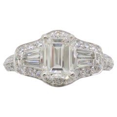 GIA Certified 1.94CTW Emerald Cut Diamond Ring with a Halo Setting