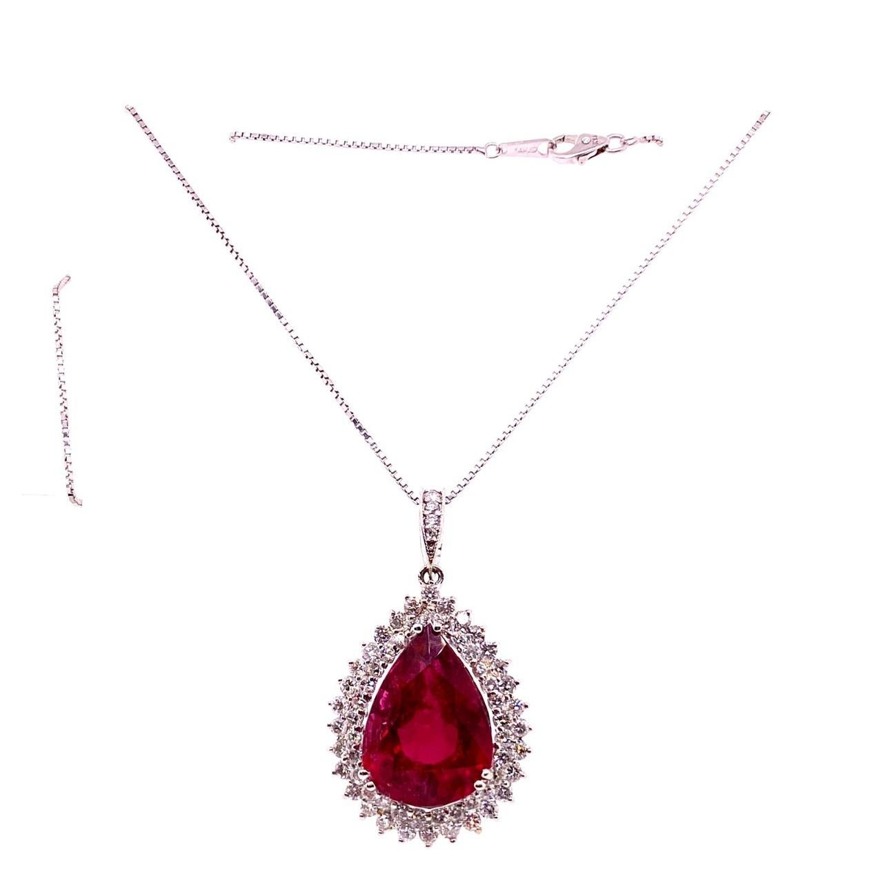 18K White Gold 9.08gm
Natural Rubellite Tourmaline 15.54ct
Diamond : 2ct G-H Color VS SI Clarity 
Artfully crafted in warm 18K white gold, this handsome style features an awe-inspiring 15.54ct Pear Shape Natural Rubellite Tourmaline center stone.