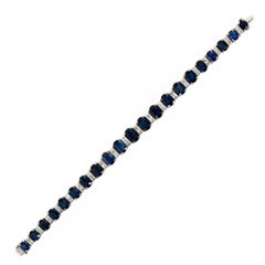GIA Certified 19.56 Carat Oval Sapphire Square Diamond Platinum Bracelet
