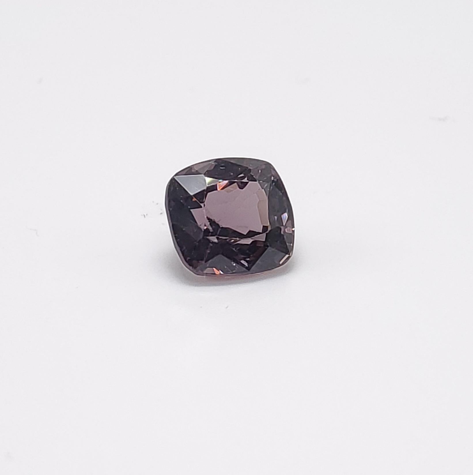 This pretty  Grayish Purple spinel Cushion cut , weighs 1.98 carats and would make a beautiful 3-stone ring, though its shape lends itself to a variety of possibilities! It measures 7.16 x 6.81 x 4.77 millimeters, is eye clean, brilliant, and