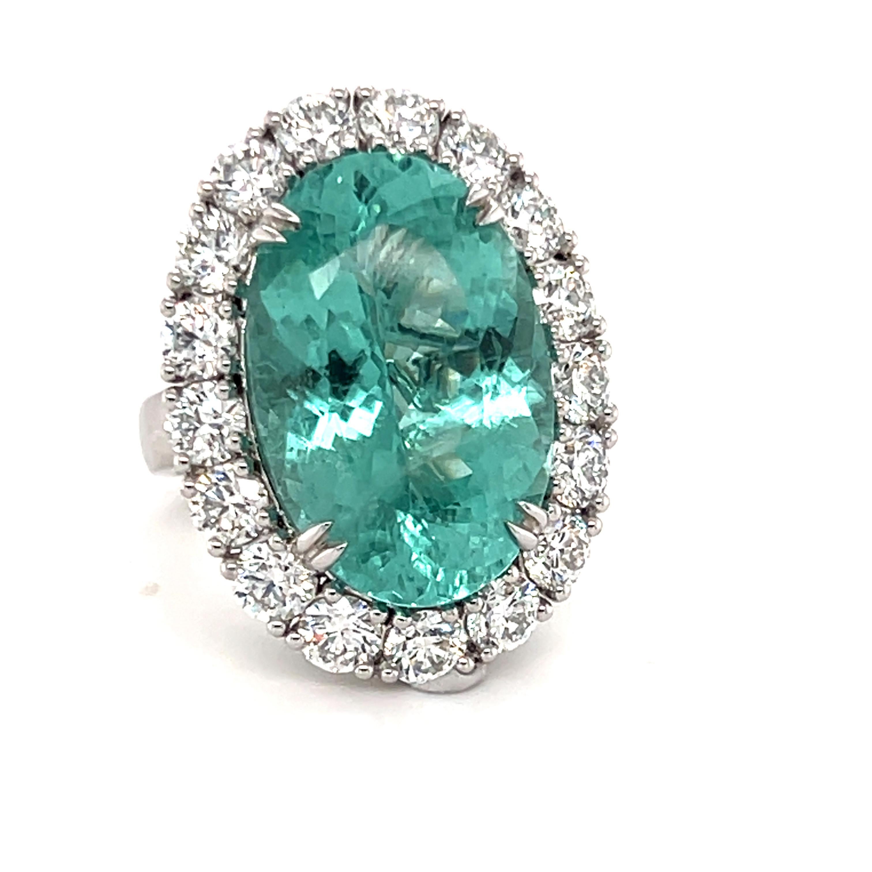 Artisan GIA Certified 19.86 Carat Oval Cut Paraiba Tourmaline Diamond Halo Cocktail Ring For Sale