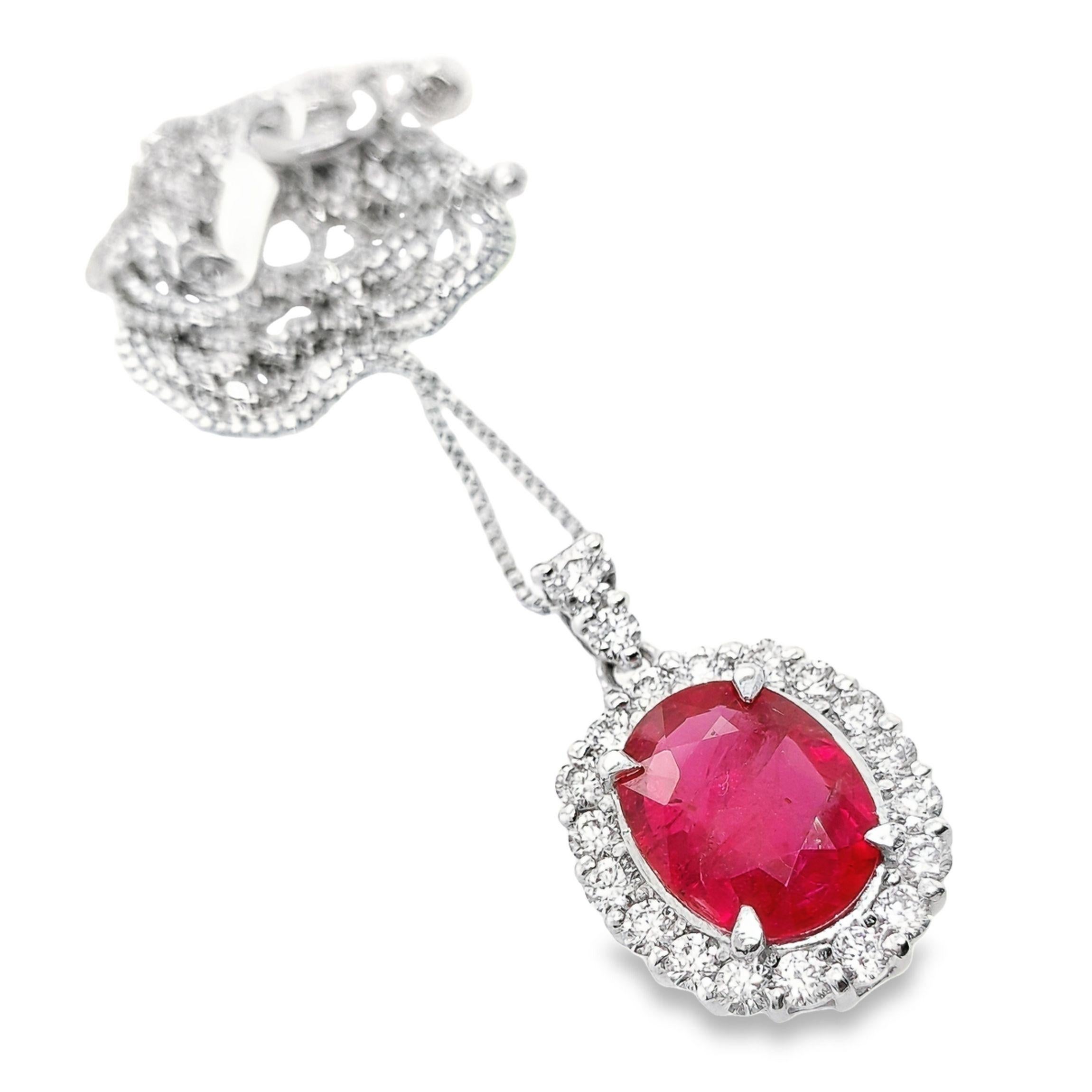 Adorn yourself with sophistication wearing our Top Crown Jewelry exquisite collection of platinum necklace featuring a dazzling 1.98-carat oval Madagascar natural ruby in a captivating purplish-red hue. Certified by GIA laboratory, this stunning