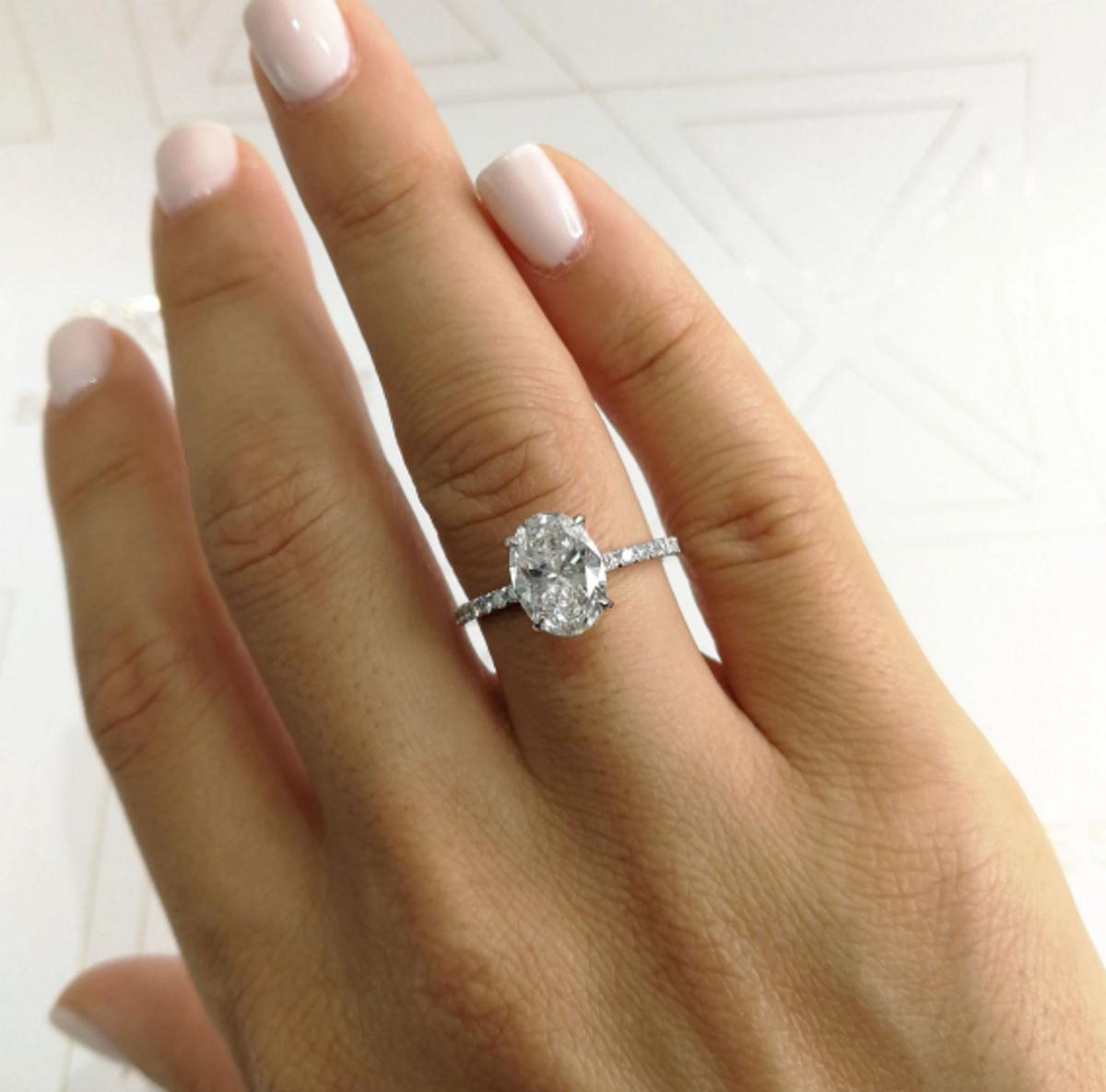 This eye-catching 2 Carat GIA certified oval cut diamond ring has perfect D color, a completely eye clean appearance, and gorgeous, lively brilliance! Oval cuts are one of the most fashionable and sought after diamond cuts, and its elongated shape