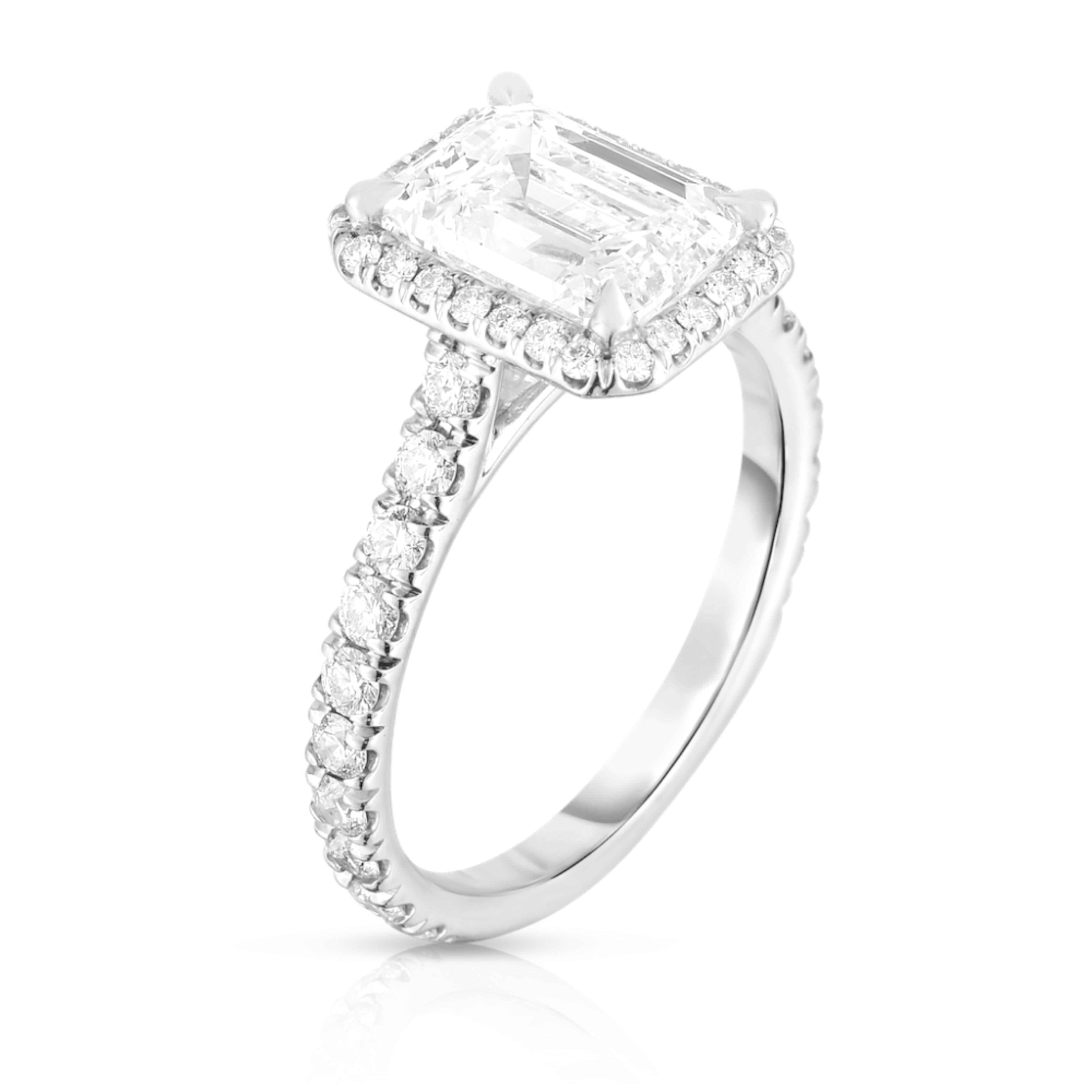 an exquisite 2 carat flawless emerald cut diamond, showcasing a stunning f color with exceptional clarity. This masterpiece features excellent polish and symmetry, ensuring it sparkles brilliantly from every angle. 

Set in a breathtaking pave
