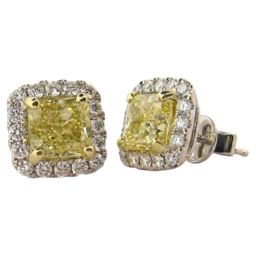 GIA Certified 2 Carat Fancy Yellow Cushion Cut Diamond Halo Stud Earrings For Sale