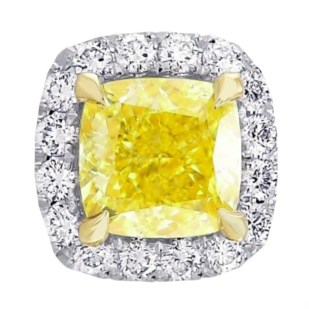 These are GIA Certified 2 Carat cushion cut fancy yellow, internally flawless and VVS1 diamond stud earrings set in yellow gold. 

Cushion cut diamonds blend the energy of a round brilliant with the symmetry of a radiant cut, a combination that