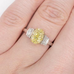 GIA Certified 2 Carat Fancy Yellow Oval Diamond Three Stone Ring