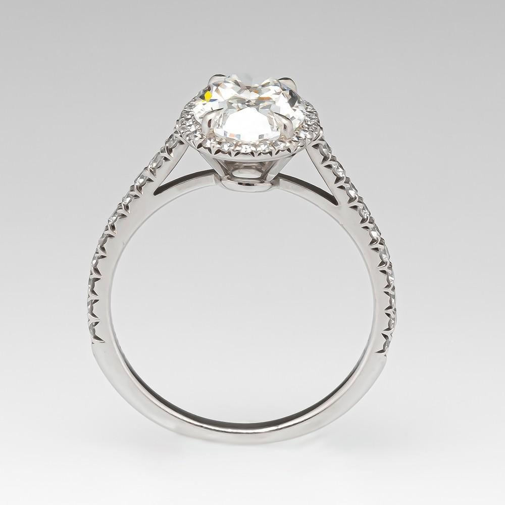 This eye-catching 2 carat GIA certified halo and pave oval cut diamond ring has excellent I color, a completely eye clean appearance, and gorgeous, lively brilliance! Oval cuts are one of the most fashionable and sought after diamond cuts, and its