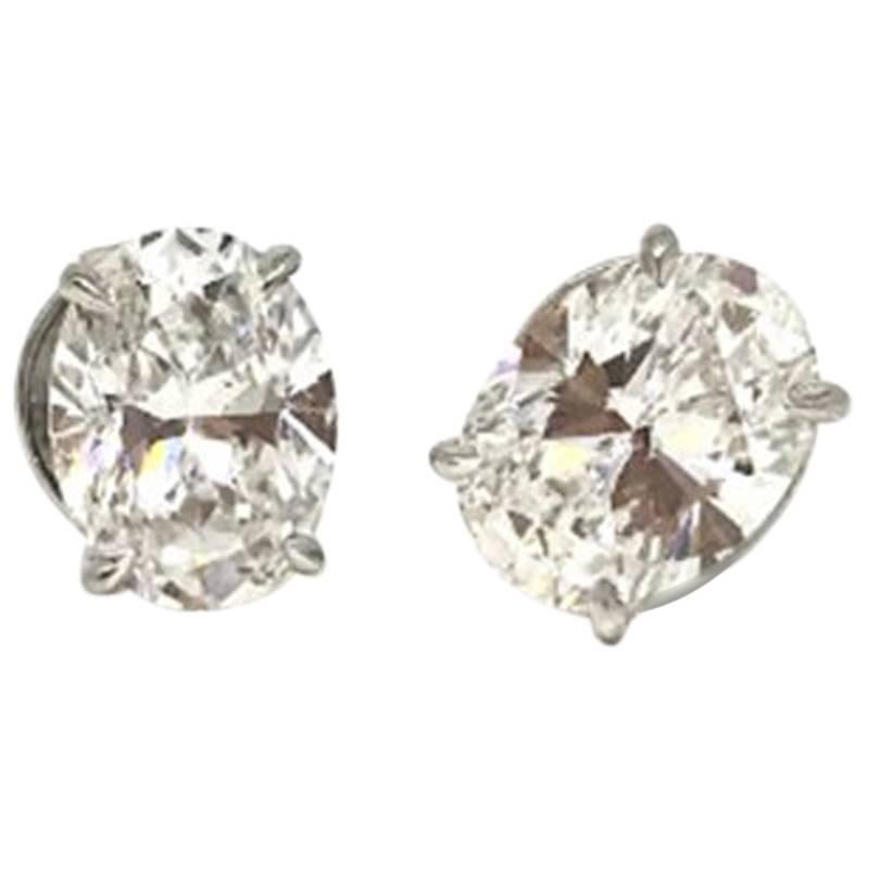 GIA Certified 2 Carat Oversize Oval Shaped Diamond Earrings For Sale
