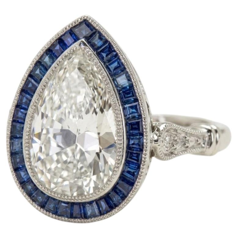 GIA Certified 2 Carat Pear Cut Diamond and Sapphire Halo Ring