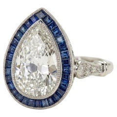 GIA Certified 2 Carat Pear Cut Diamond and Sapphire Halo Ring