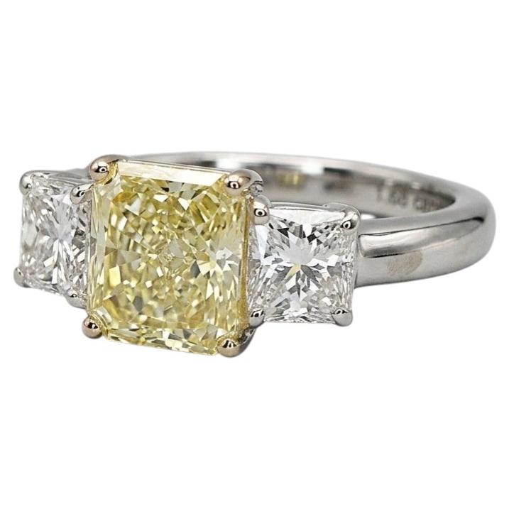 GIA Certified 2 Carat Radiant Cut Fancy Yellow Diamond Three-Stone Ring