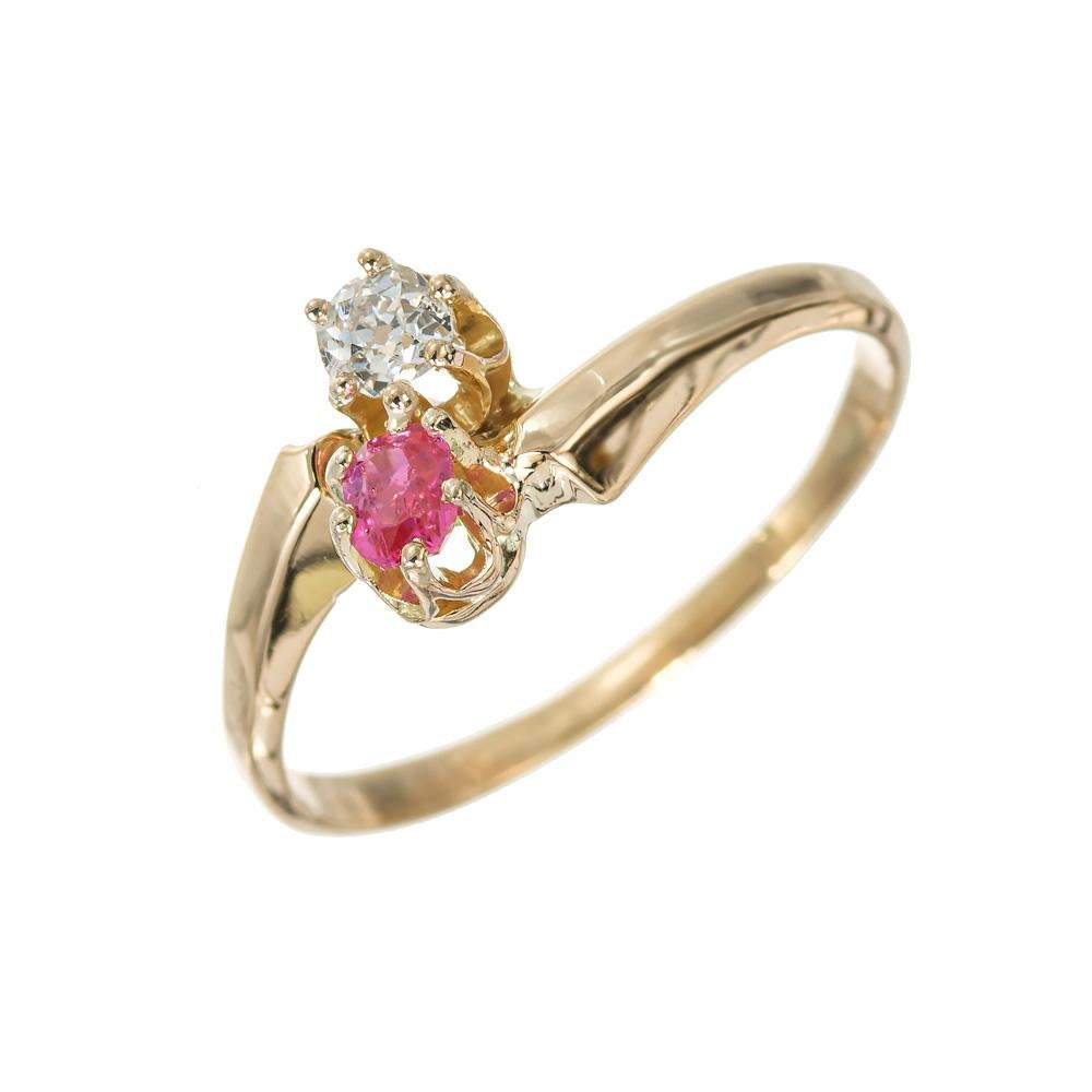 Vintage Victorian 1880's ruby and diamond yellow gold ring. GIA certified natural no heat .20cts octagonal Burma Myanmar red ruby with a old mine cut .15ct diamond in a handmade 18k yellow gold setting.  

1 octagonal purplish red ruby, SI approx.