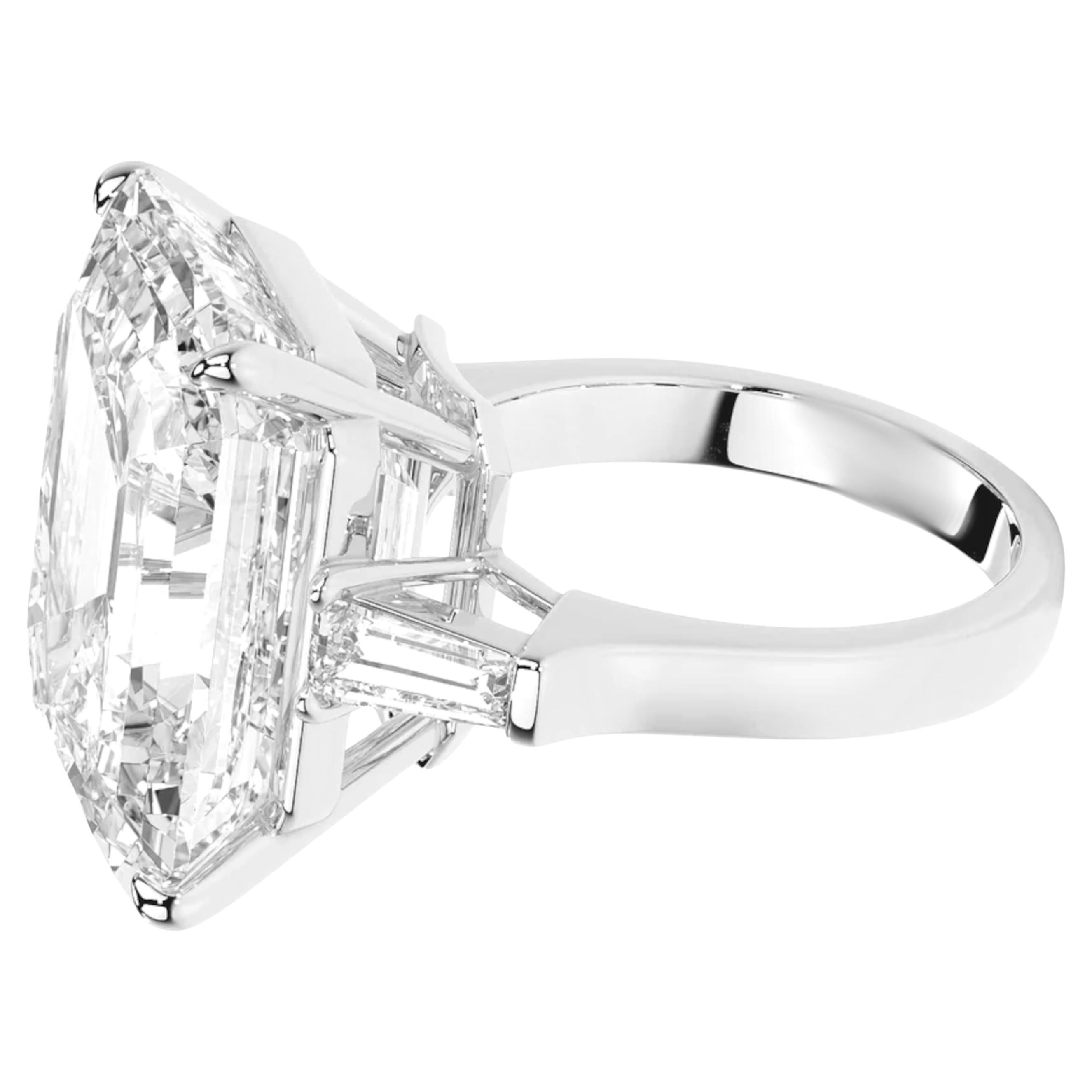 A Rarity Beyond Compare – 20.56-Carat Golconda-Type Diamond Ring
Timeless. Exquisite. Unparalleled.

Presenting a magnificent 20.56-carat Type IIa Golconda-style emerald-cut diamond, certified by GIA. This masterpiece, set in platinum and flanked by