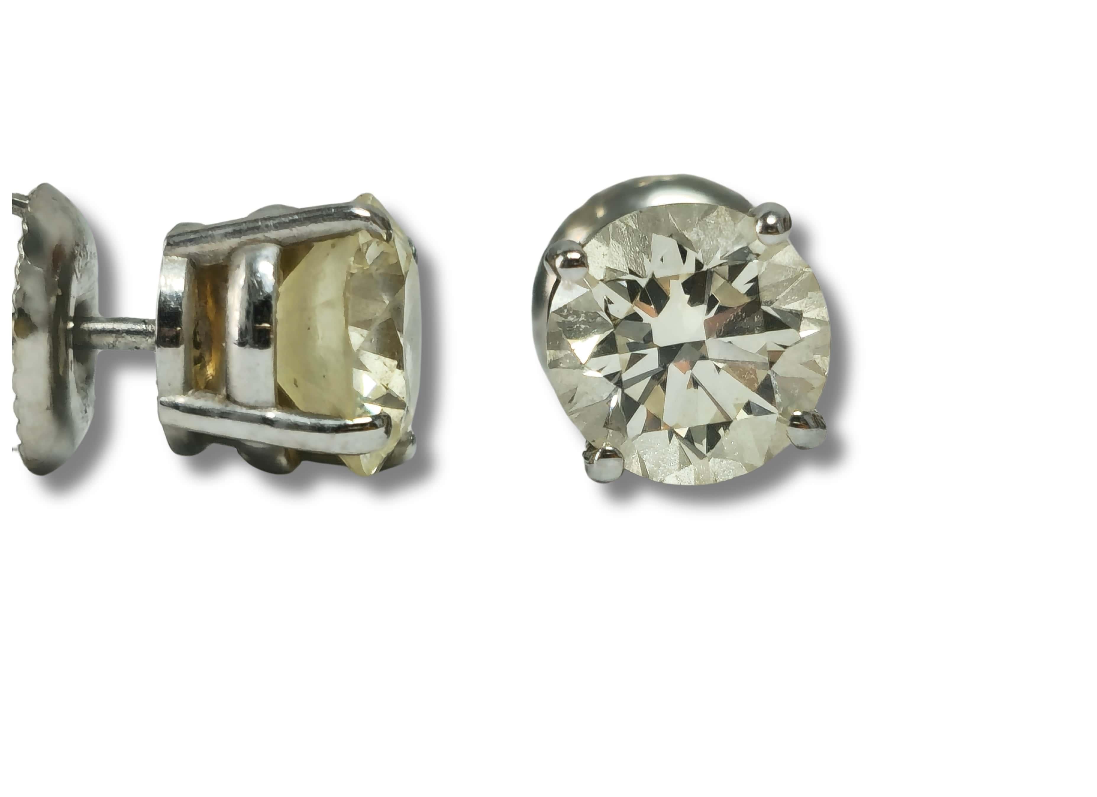 Contemporary GIA Certified 2.00 Carat Diamond Studs in White Gold For Sale
