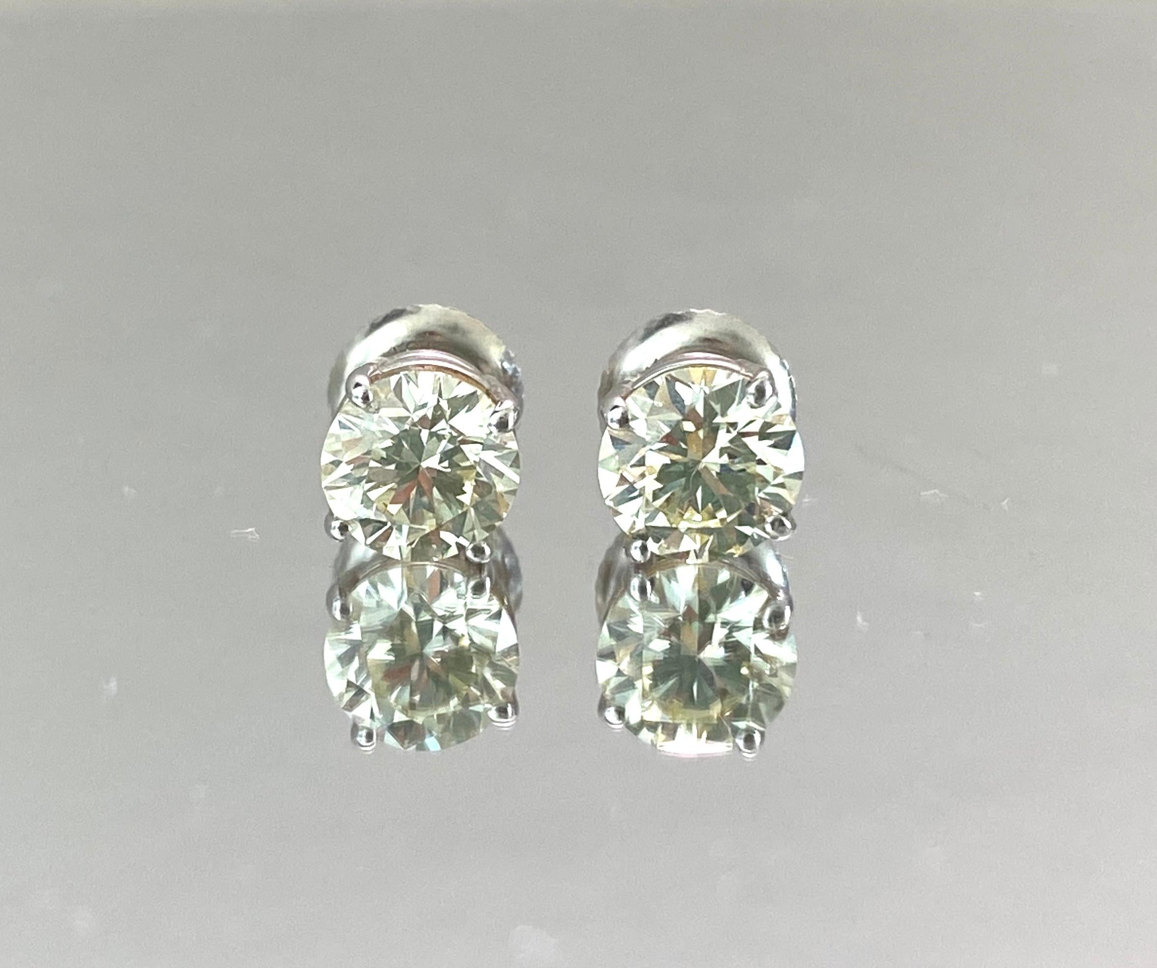 Round Cut GIA Certified 2.00 Carat Diamond Studs in White Gold For Sale