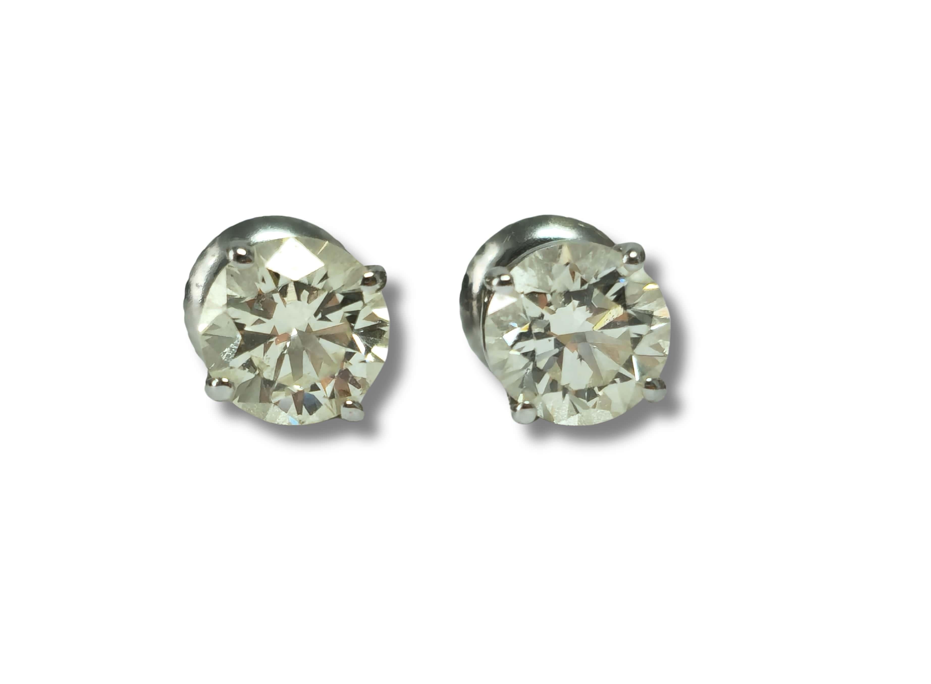 Brilliant Cut GIA Certified 2.00 Carat Diamond Studs in White Gold For Sale