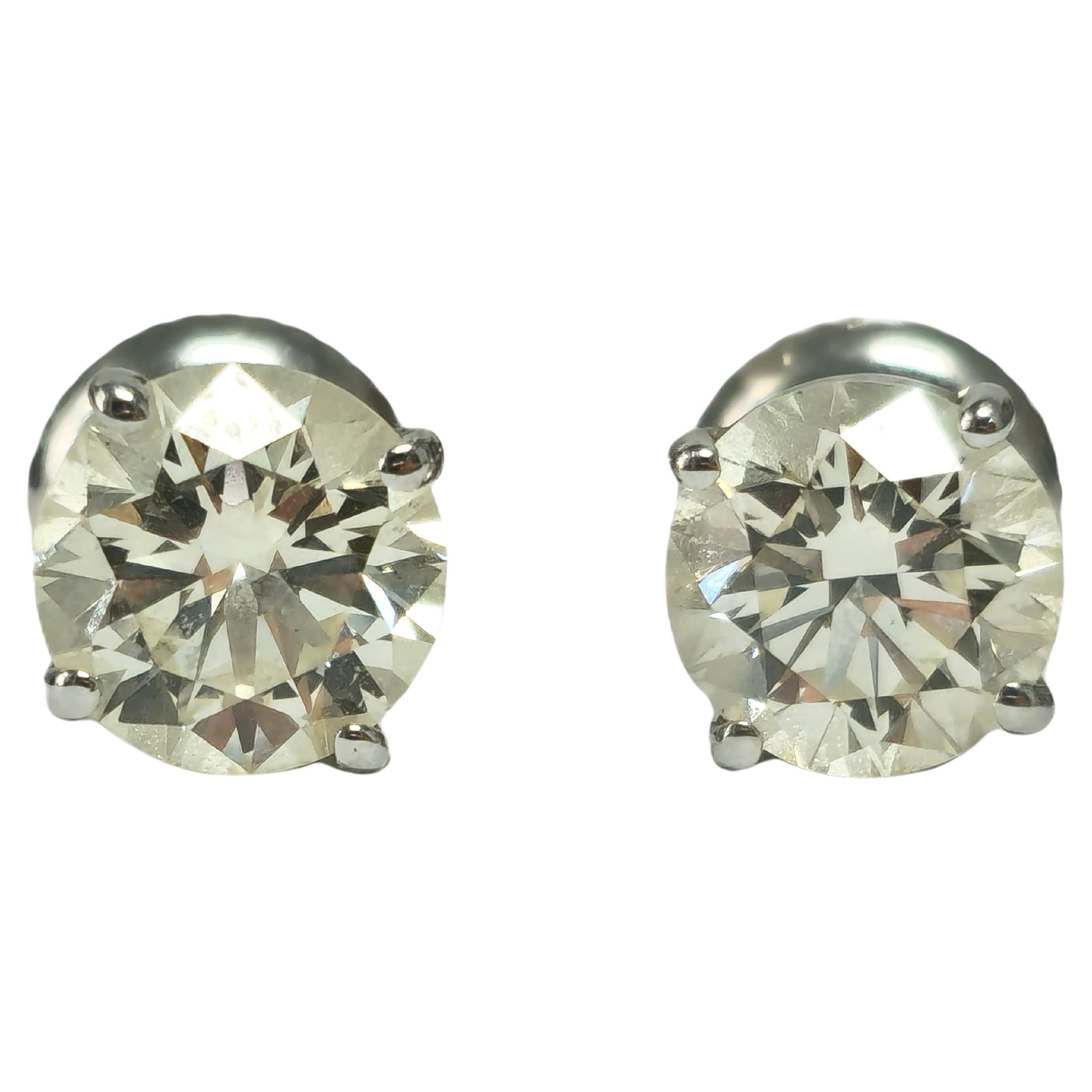GIA Certified 2.00 Carat Diamond Studs in White Gold For Sale
