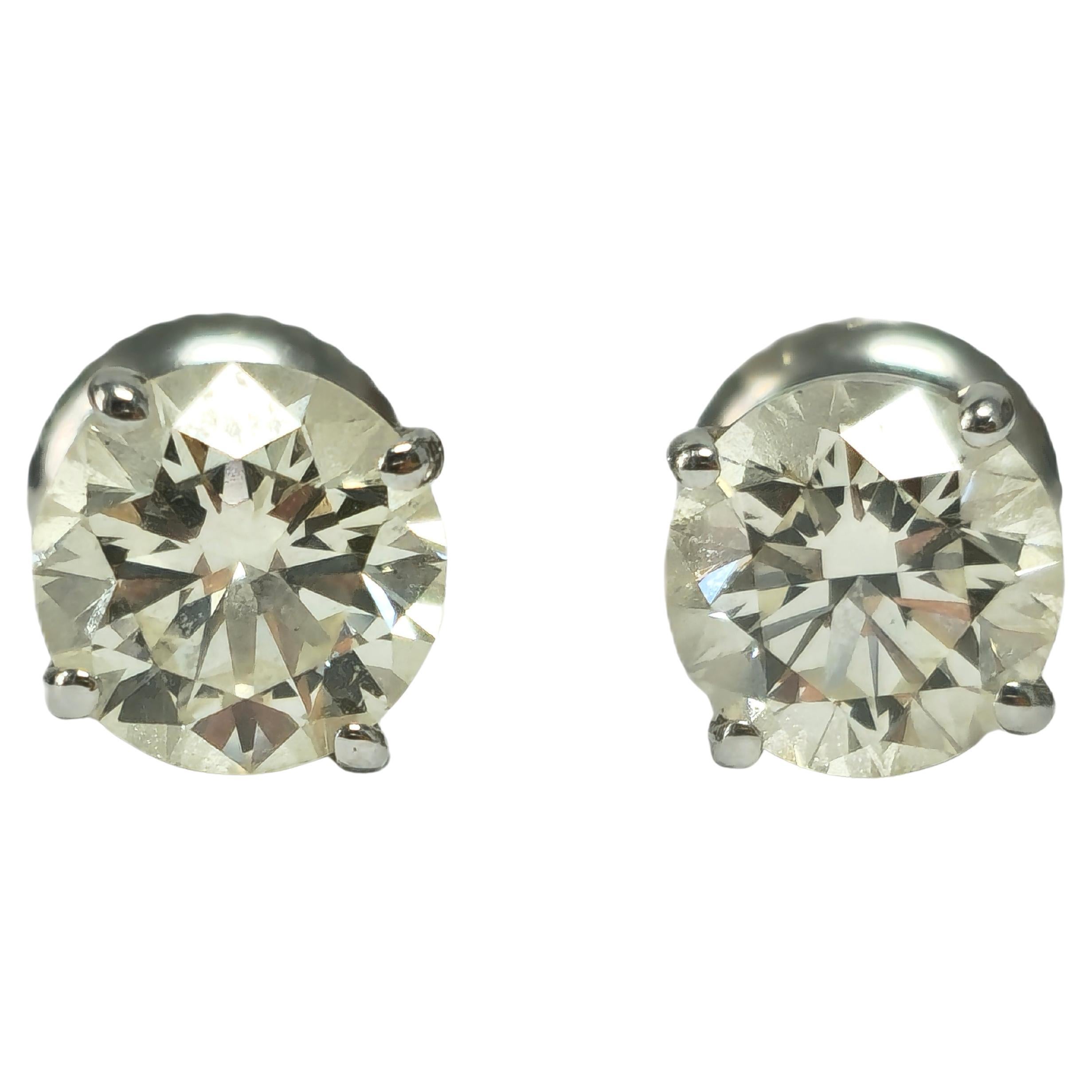 GIA Certified 2.00 Carat Diamond Studs in White Gold For Sale