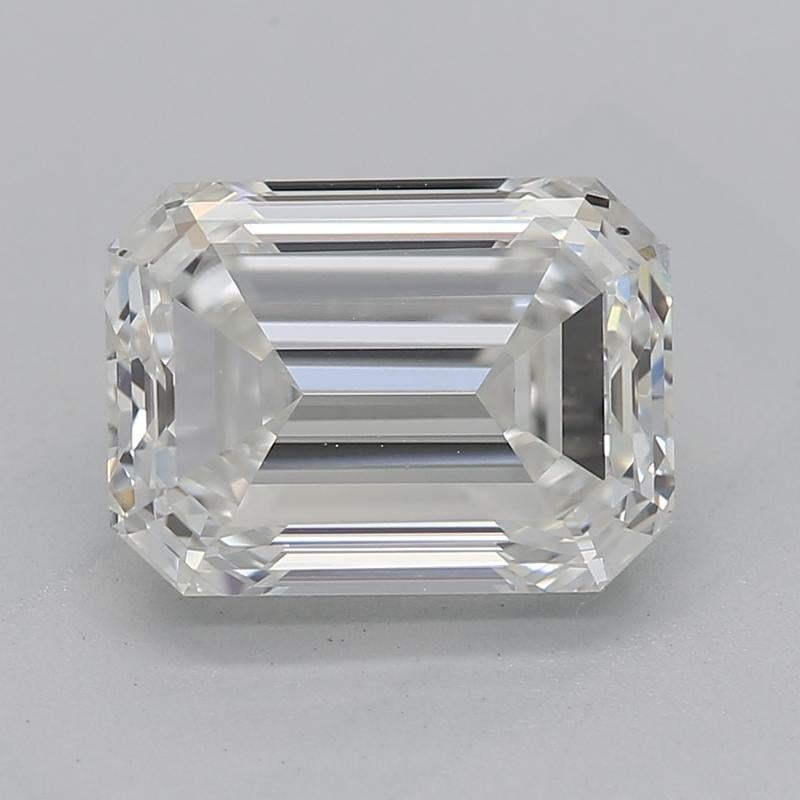 Handcrafted in New York, this exquisite diamond ring features a remarkable center stone of emerald I SI1 weighing 2.00 , secured in a elegant prong setting that enhances its natural brilliance. A striking hidden halo of pave diamonds accentuates the