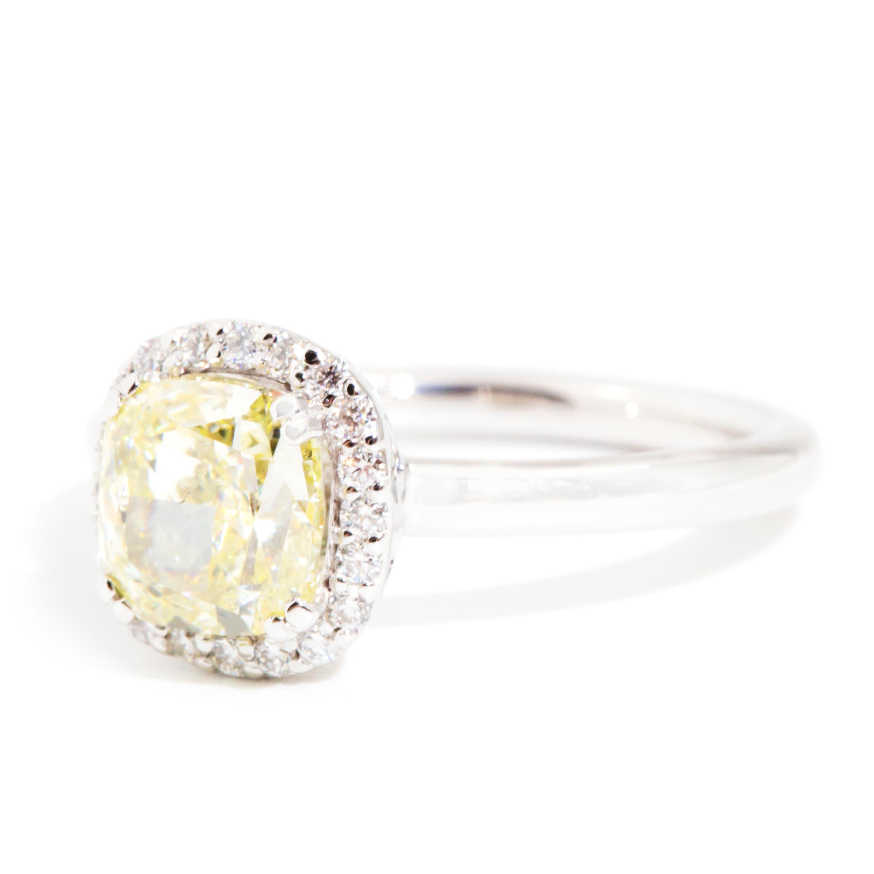 Women's GIA Certified 2.00 Carat Fancy Yellow Diamond Contemporary Halo Engagement Ring