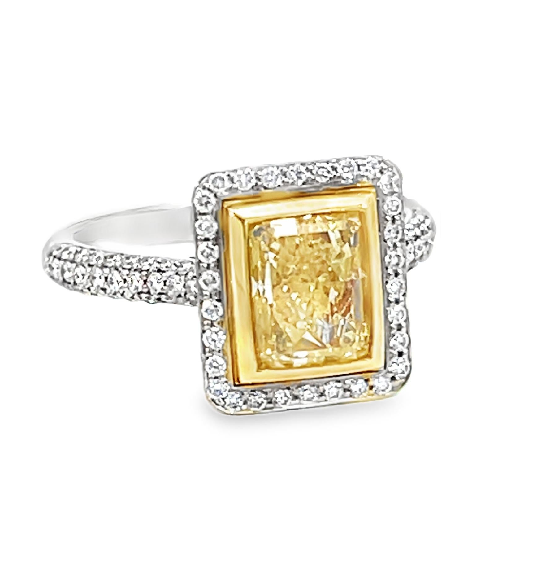 Modern GIA Certified 2.00 Carat Fancy Yellow Diamond Engagement Ring For Sale