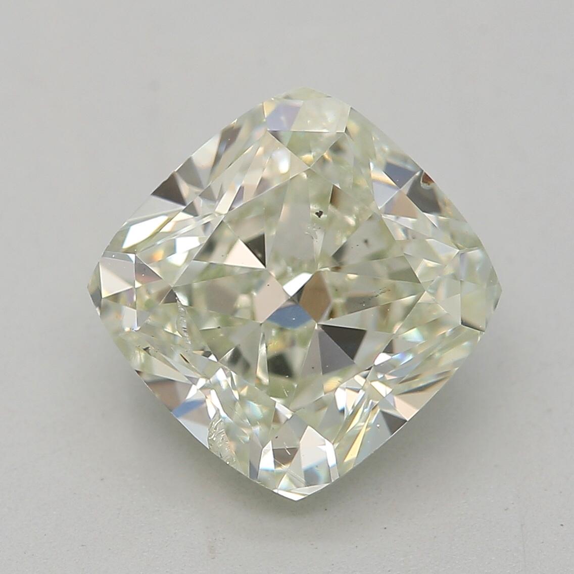 Certificate: GIA
Report Number: 2248183594
Shape And Cut: Cushion
Carat Weight: 2.00 carat
Measurements: 7.04 x 6.91 x 4.56 mm
Color Grade: Fancy Yellowish Green

FEATURES OF THE DIAMOND:

This fancy yellowish green diamond is a rare and captivating