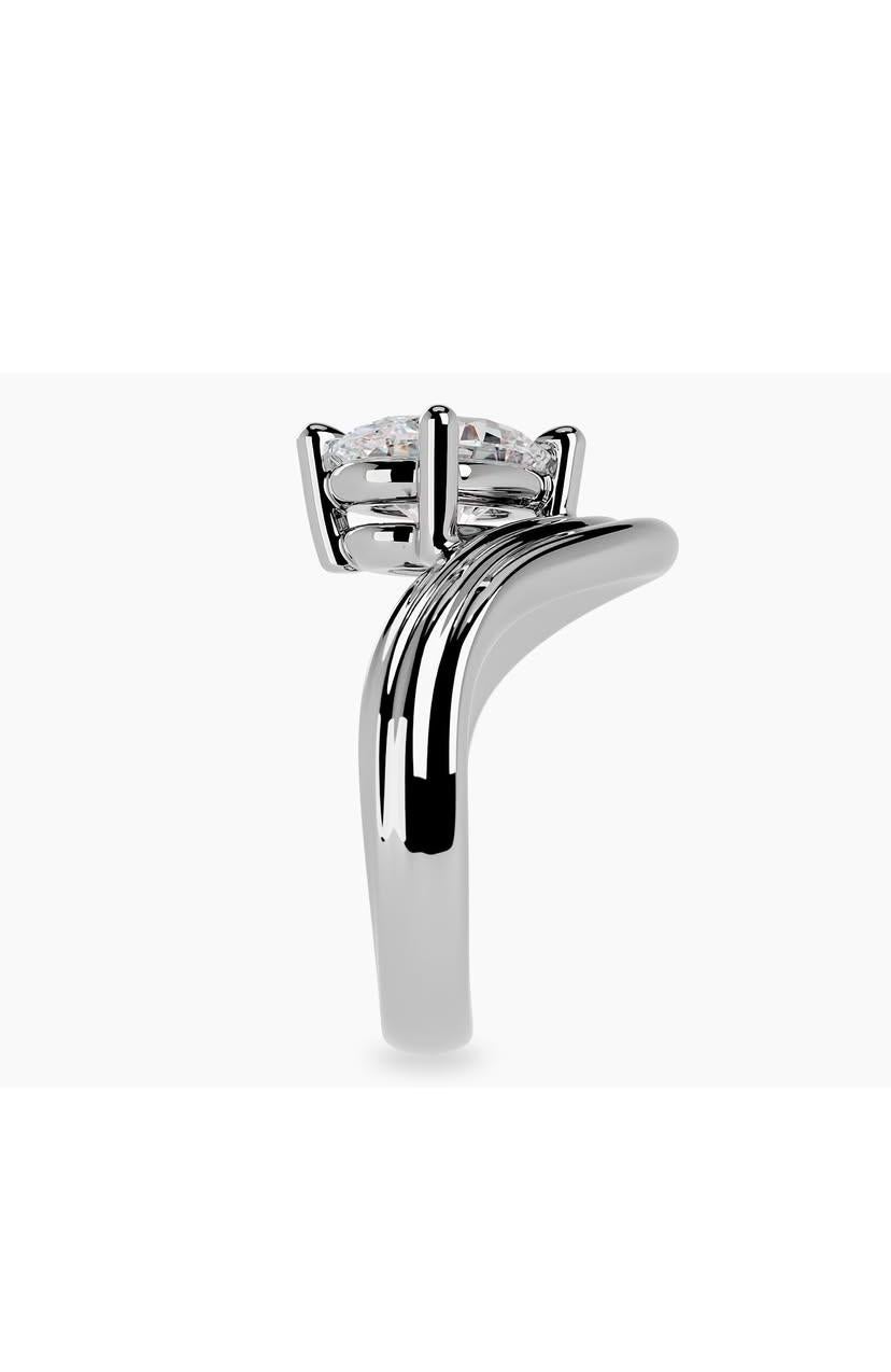 This exquisite 2 carat oval diamond ring captures the essence of contemporary sophistication while honouring  classic design principles.The flawless oval-cut diamond is cradled in a solid setting, symbolising strength and grace.
The band, crafted
