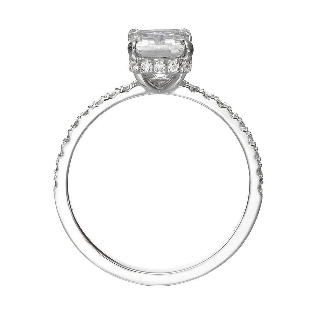 This incredible 2.00 ct engagement ring will leave you speechless! The stunning 1.50 ct radiant cut center diamond is GIA certified at H-SI2, white and eye-clean! Its wrapped with pave set diamonds underneath and floating atop a delicate diamond