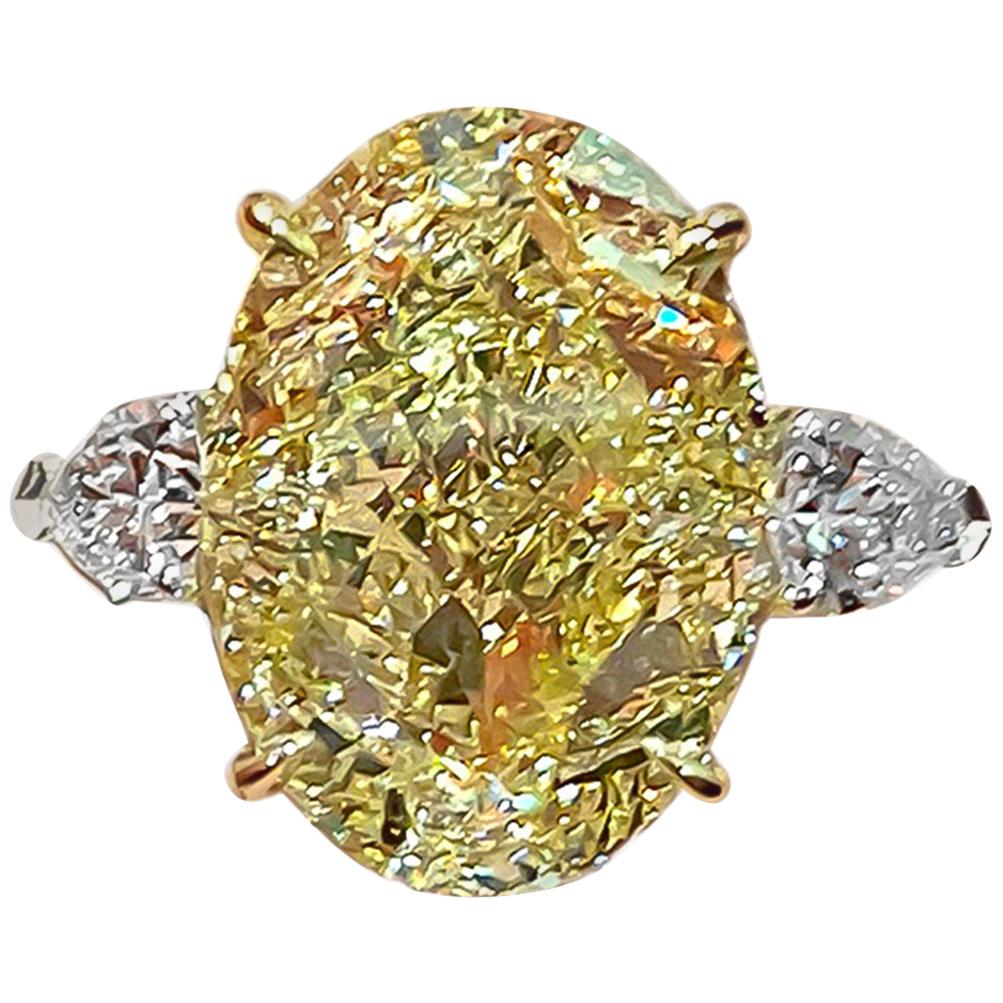 GIA Certified 20.02 Carat Oval Fancy Intense Yellow Diamond Ring For