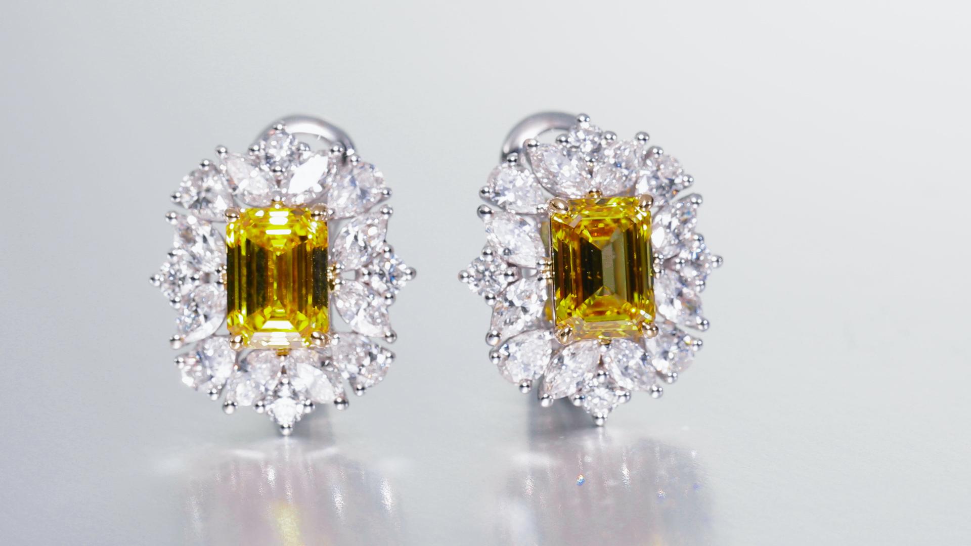 Women's GIA Certified, 2.00ct Earrings in Natural Fancy Vivid Yellow Emerald earrings. For Sale