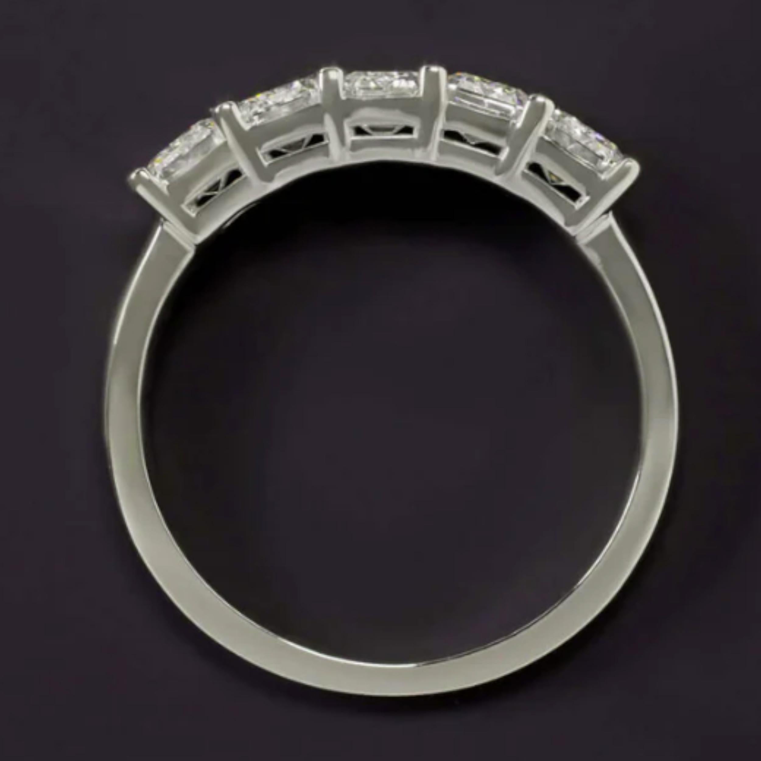💎 Metal: Platinum
💫 Total Carat Weight: 2.00ct
✨ Diamond Quality: GIA Certified  G Color  Flawless - VS1 Clarity
💎 Shape: Emerald Cut
📏 Ring Size: 6.5

A modern masterpiece, this 2.00ct emerald-cut diamond wedding band is the epitome of