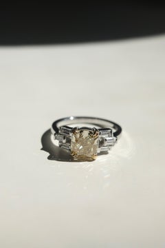 GIA Certified 2.00ct Fancy Yellow Diamond and Baguette Diamond White Gold Ring