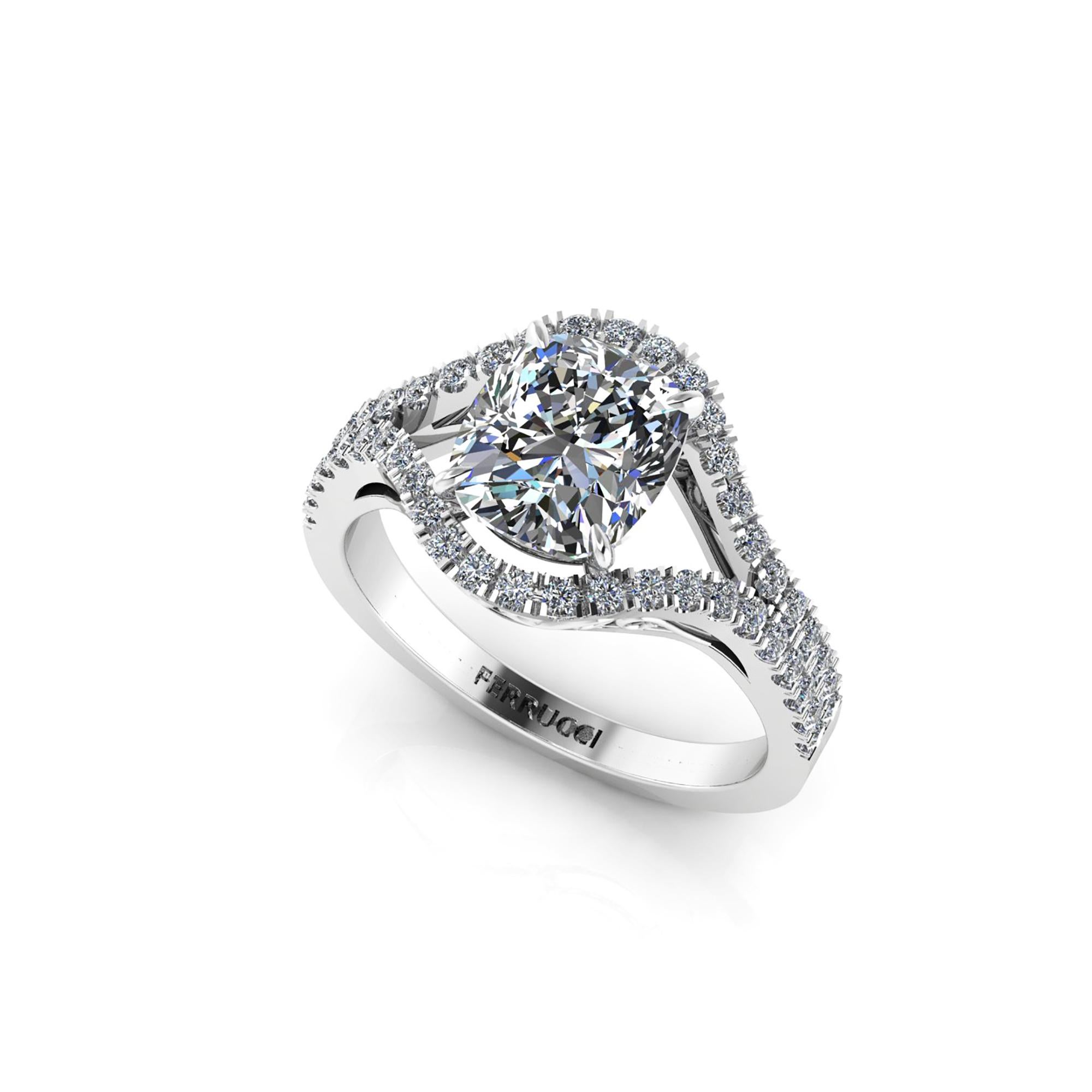GIA Certified 2.01 carat Cushion diamond set in a split shank, double halo of Diamonds pave set in a 18k white gold ring, with swirls of white gold in a cathedral style.

The ring is size 5.75, we offer complimentary sizing upon order
