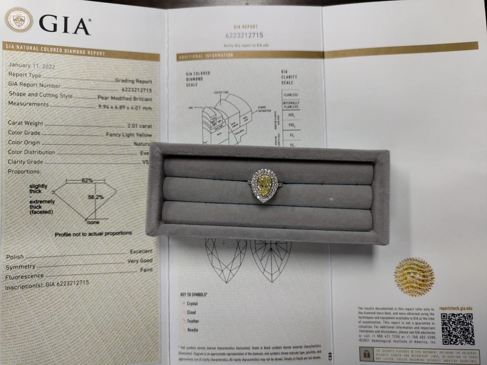 GIA Certified 2.01 Carat Fancy Light Yellow Diamond 18K Gold Double Halo Ring For Sale 4