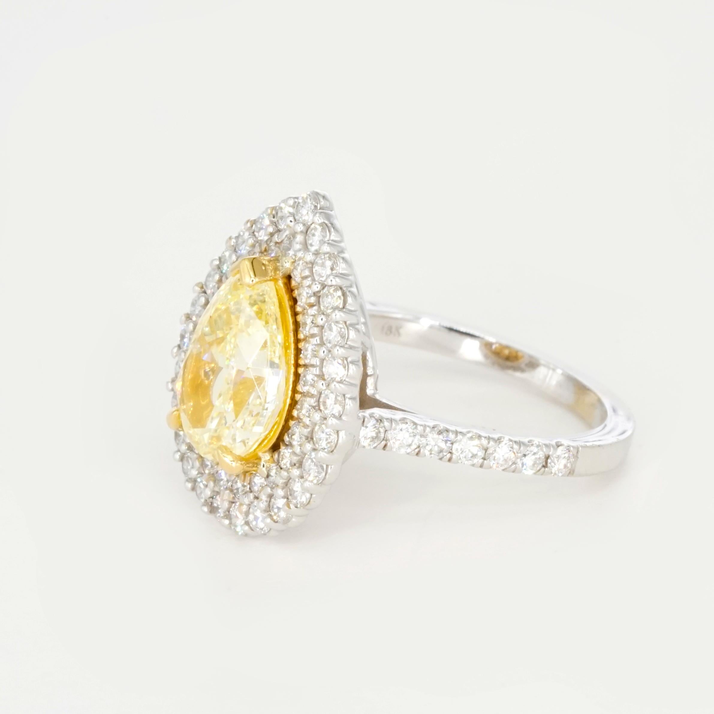 Contemporary GIA Certified 2.01 Carat Fancy Light Yellow Diamond 18K Gold Double Halo Ring For Sale