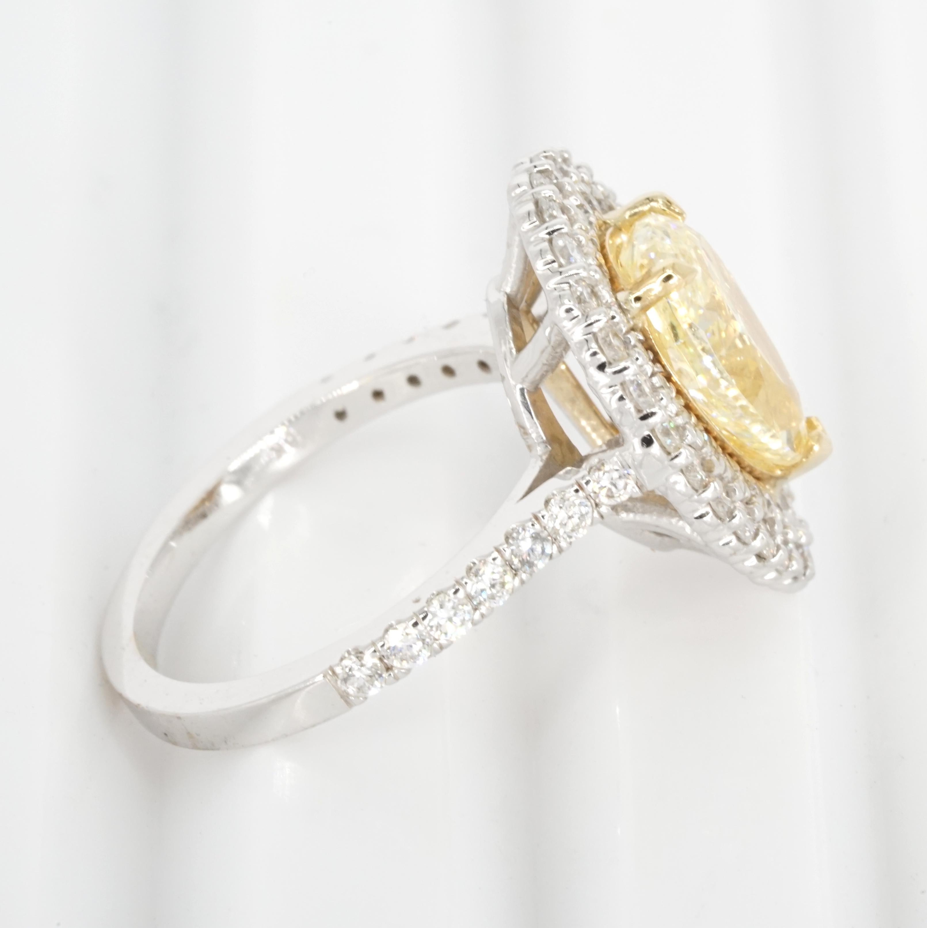 Women's or Men's GIA Certified 2.01 Carat Fancy Light Yellow Diamond 18K Gold Double Halo Ring For Sale