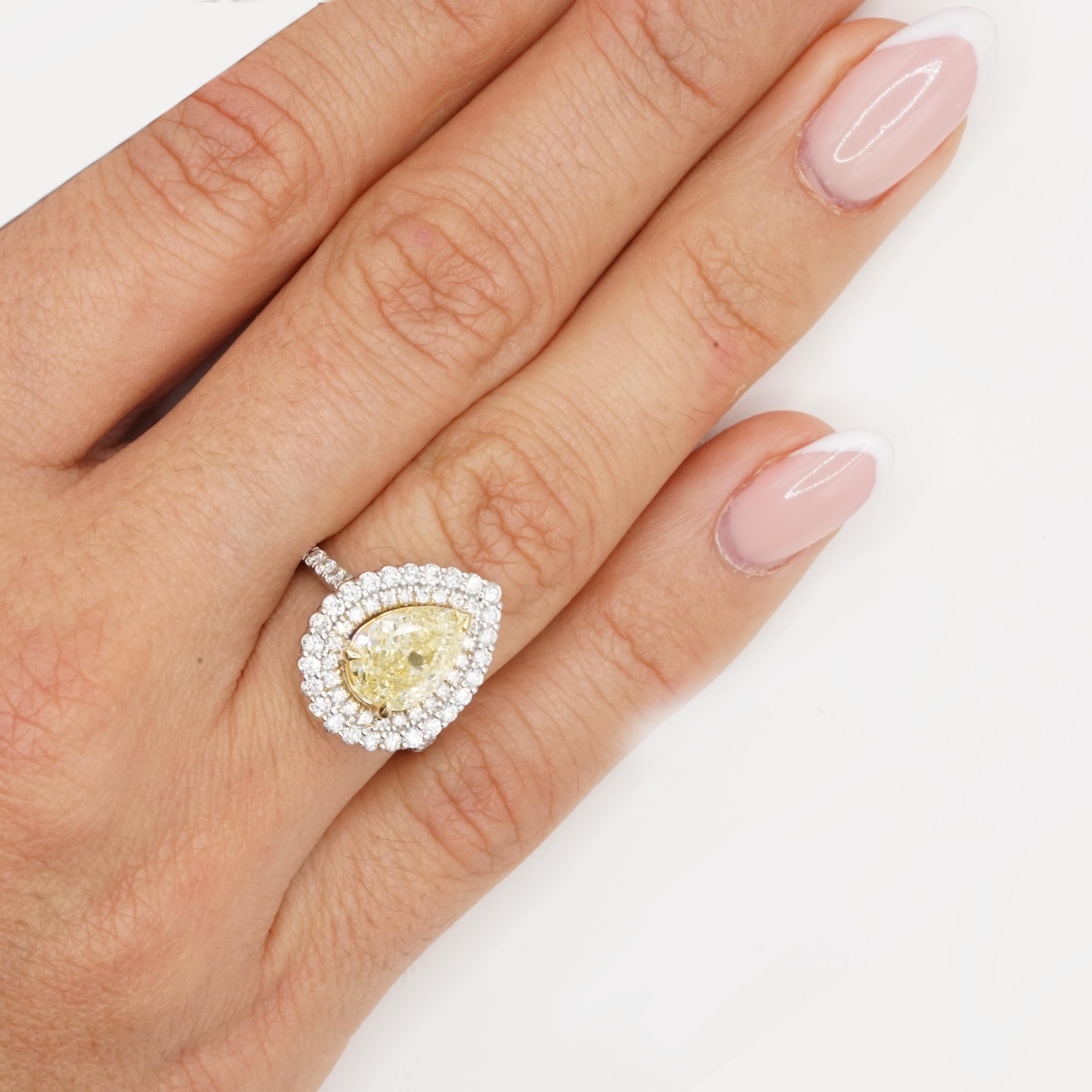 GIA Certified 2.01 Carat Fancy Light Yellow Diamond 18K Gold Double Halo Ring For Sale 3