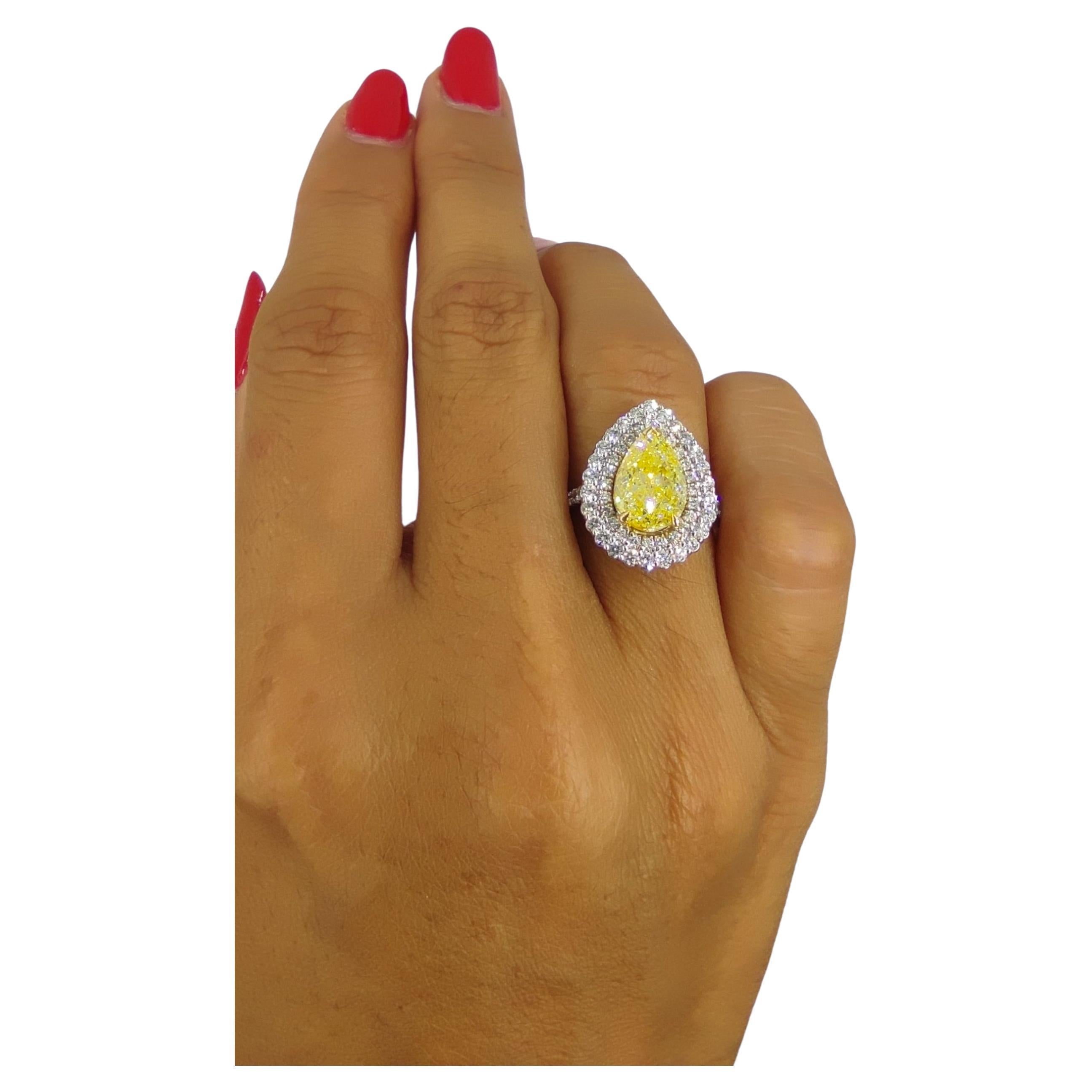 GIA Certified 2.01 Carat Fancy Light Yellow Diamond 18K Gold Double Halo Ring For Sale