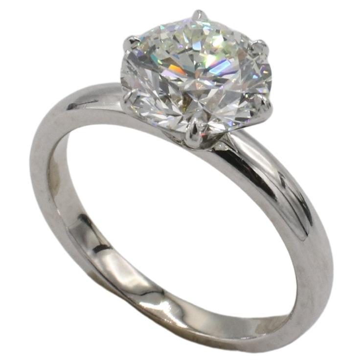GIA Certified 2.01 Carat J VS1 Round Natural Diamond Solitaire Engagement Ring 
Metal: 18k white gold
Weight: 3.25 grams
Diamond: 2.01 Carat J VS1 round natural diamond
GIA report number: 6412281516
Size: 5.25 (US)
TDDD F35000001
