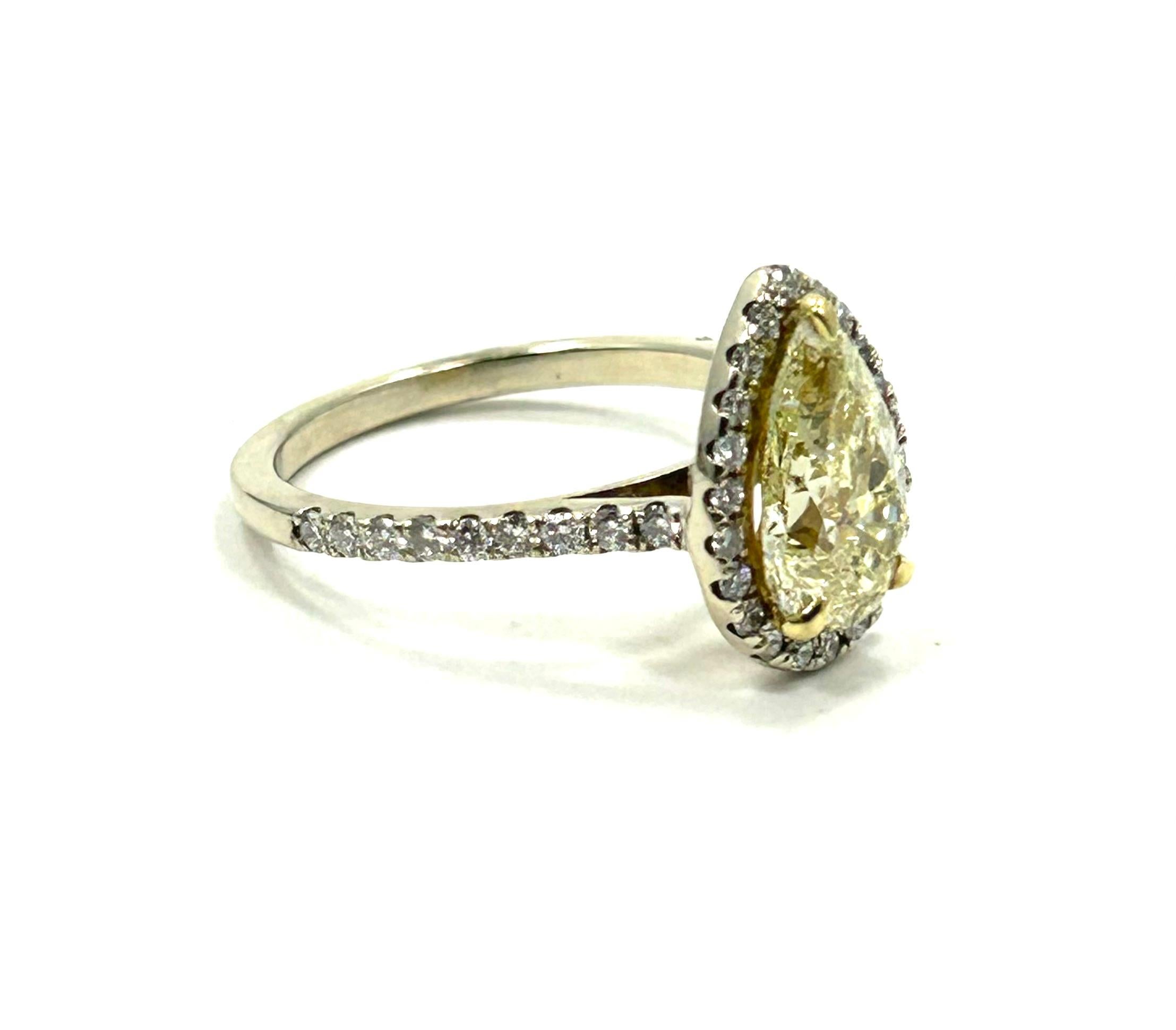 Contemporary Gia Certified 2.01 Carat Lt. Fancy Yellow Diamond Engagement Ring For Sale