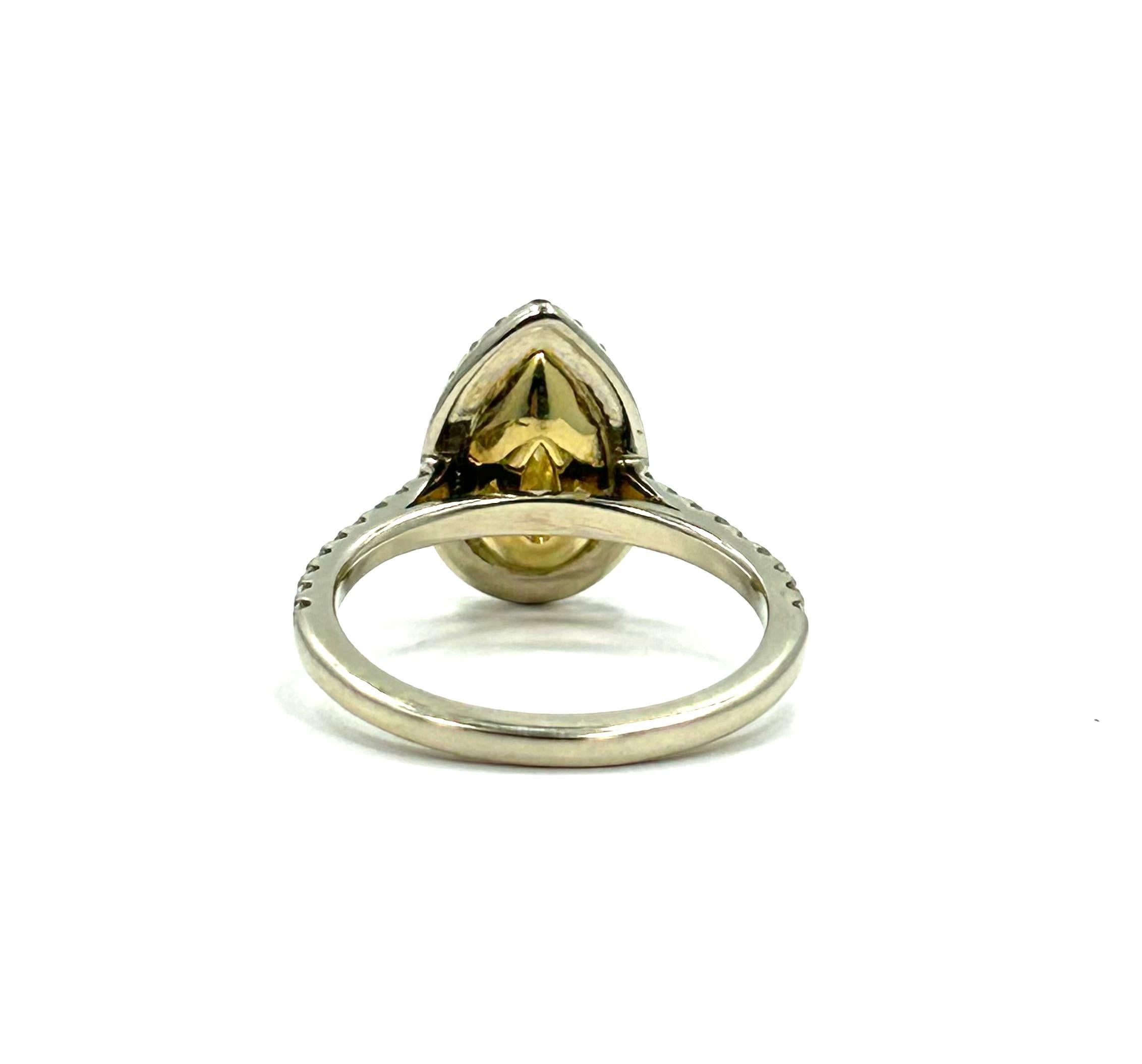 Pear Cut Gia Certified 2.01 Carat Lt. Fancy Yellow Diamond Engagement Ring For Sale