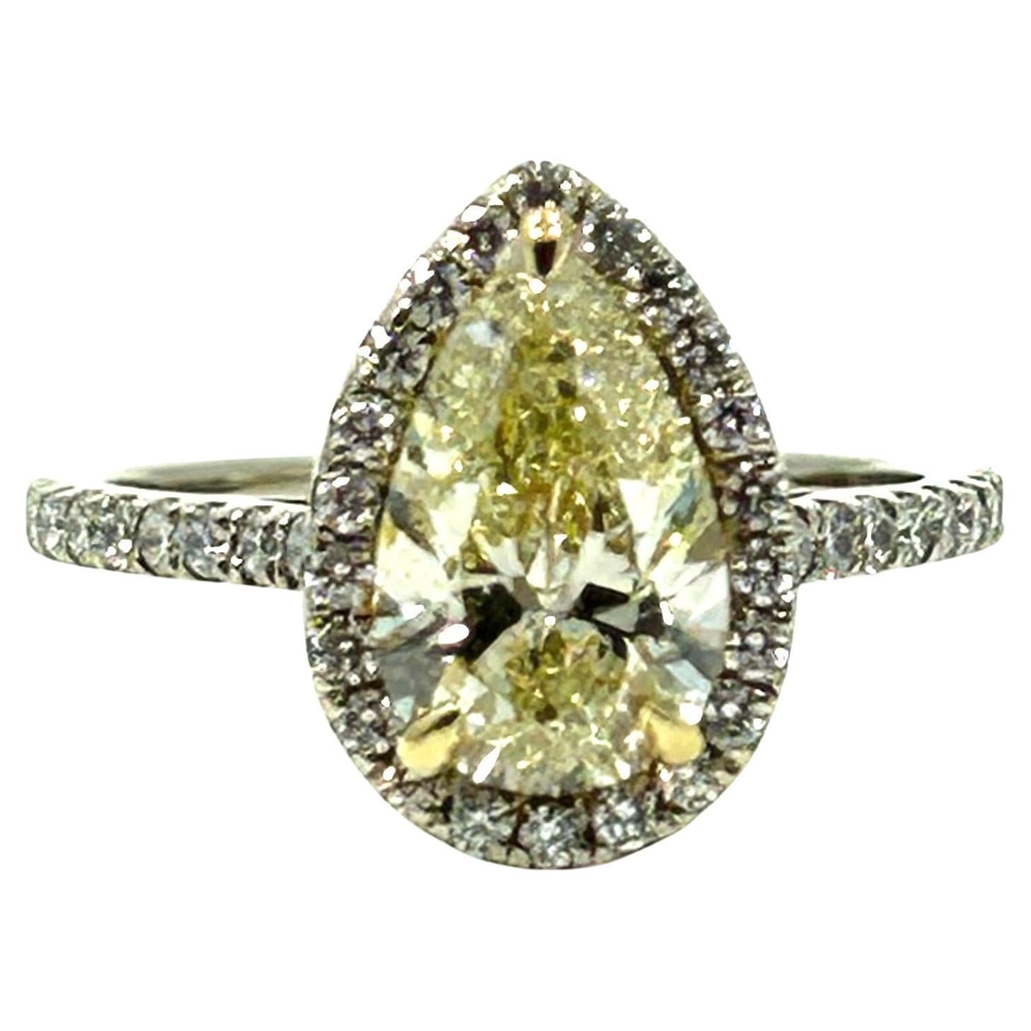 Gia Certified 2.01 Carat Lt. Fancy Yellow Diamond Engagement Ring For Sale