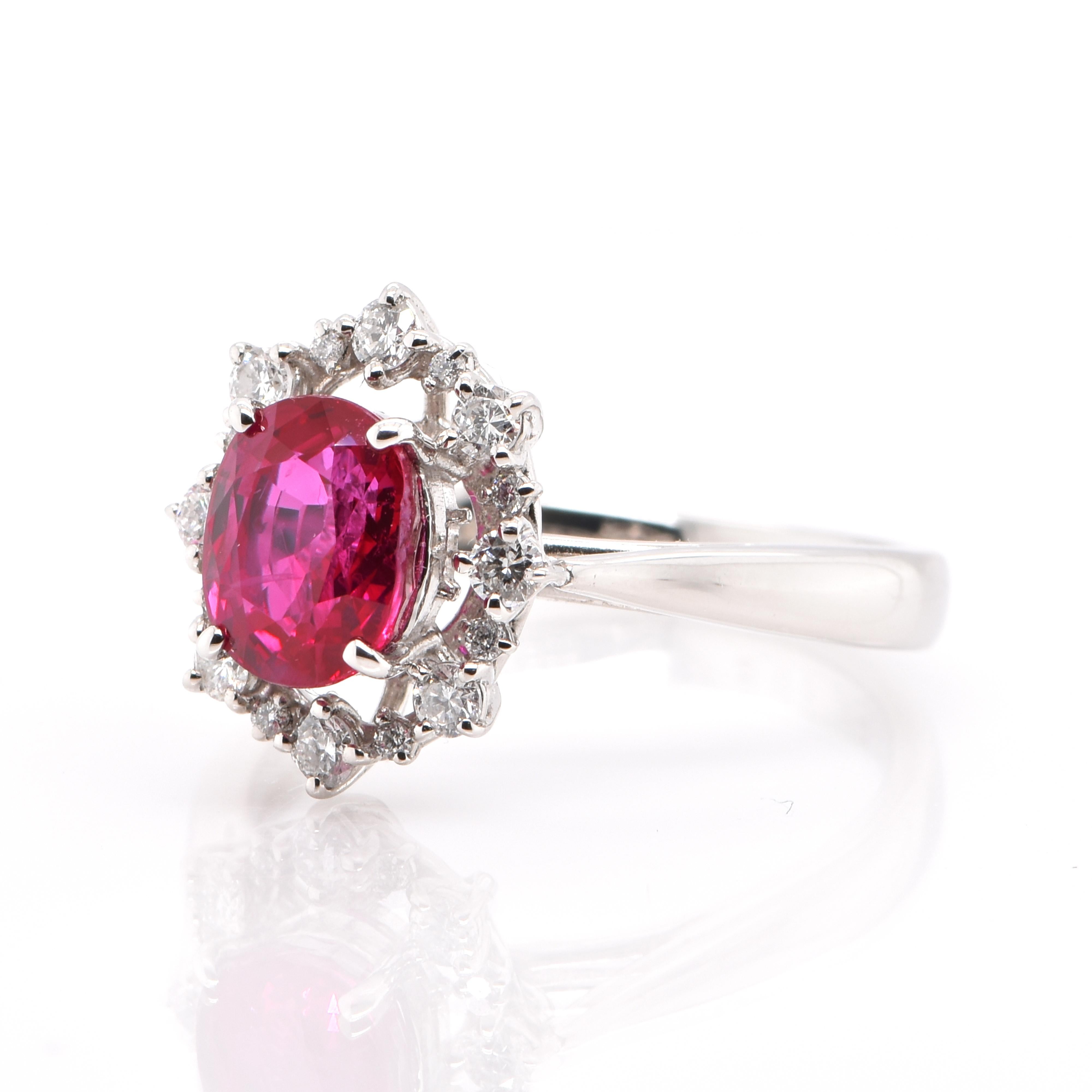 A beautiful Engagement Ring featuring a 2.01 Carat, GIA Certified, Natural, Burmese Heated Ruby and 0.29 Carats of Round Brilliant Diamond Accents set in Platinum. Rubies are referred to as 