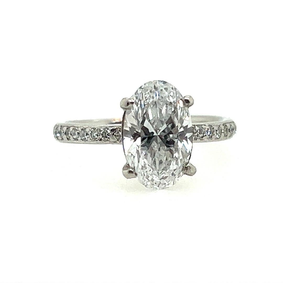 Modern GIA Certified 2.01 Carat Natural Oval “D” Colorless SI1 Diamond Engagement Ring For Sale